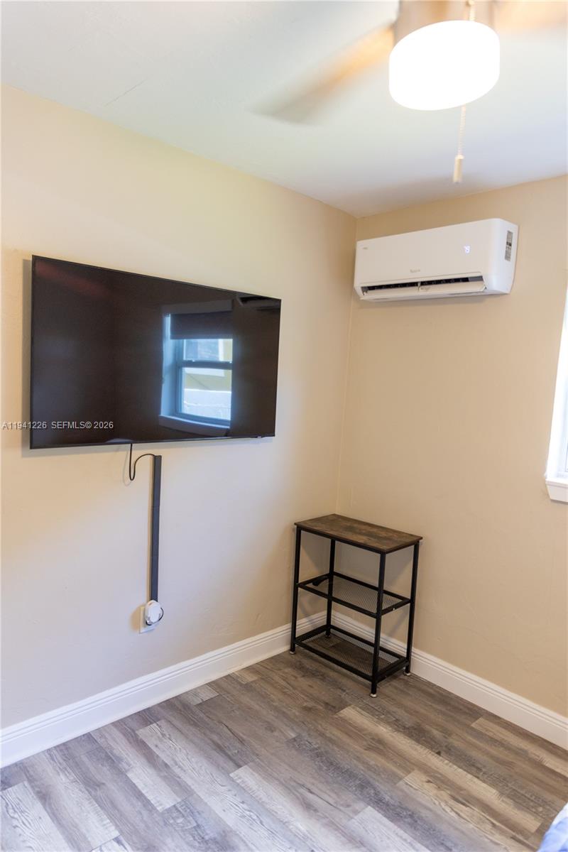 Well-appointed guest bedroom at 250 14th Way - Home in Dania Beach