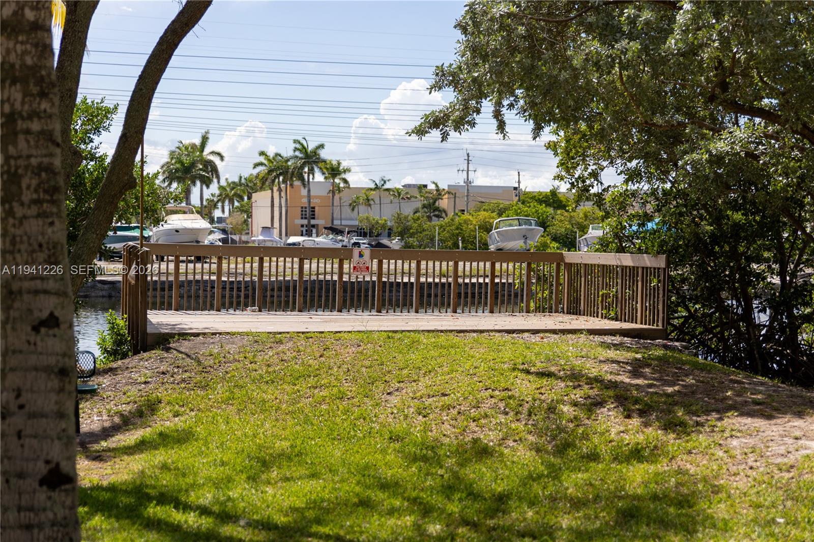 Well-appointed guest bedroom at 250 14th Way - Home in Dania Beach