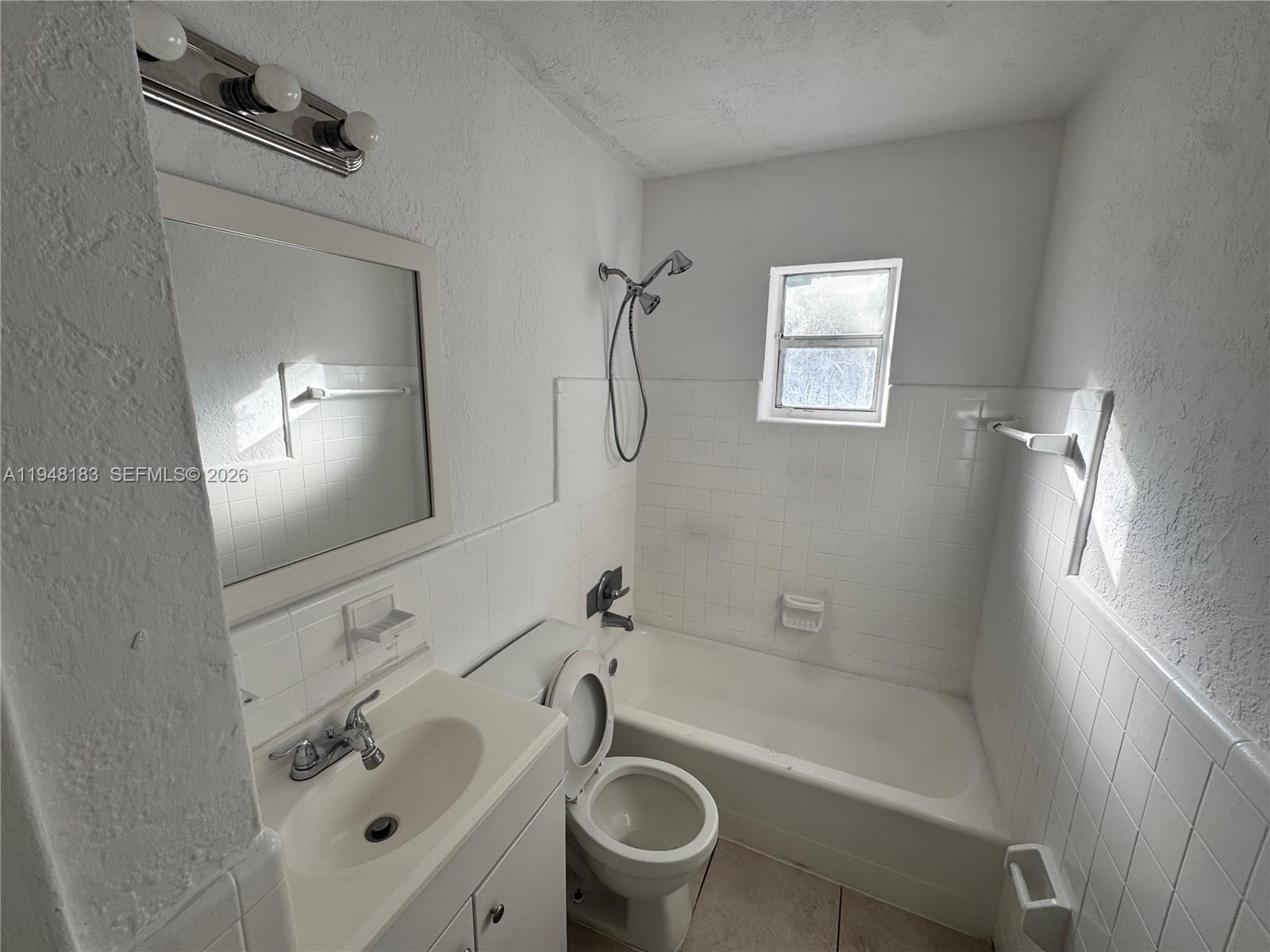 Open-concept living area at 4851 44th Ave - Home in Dania Beach