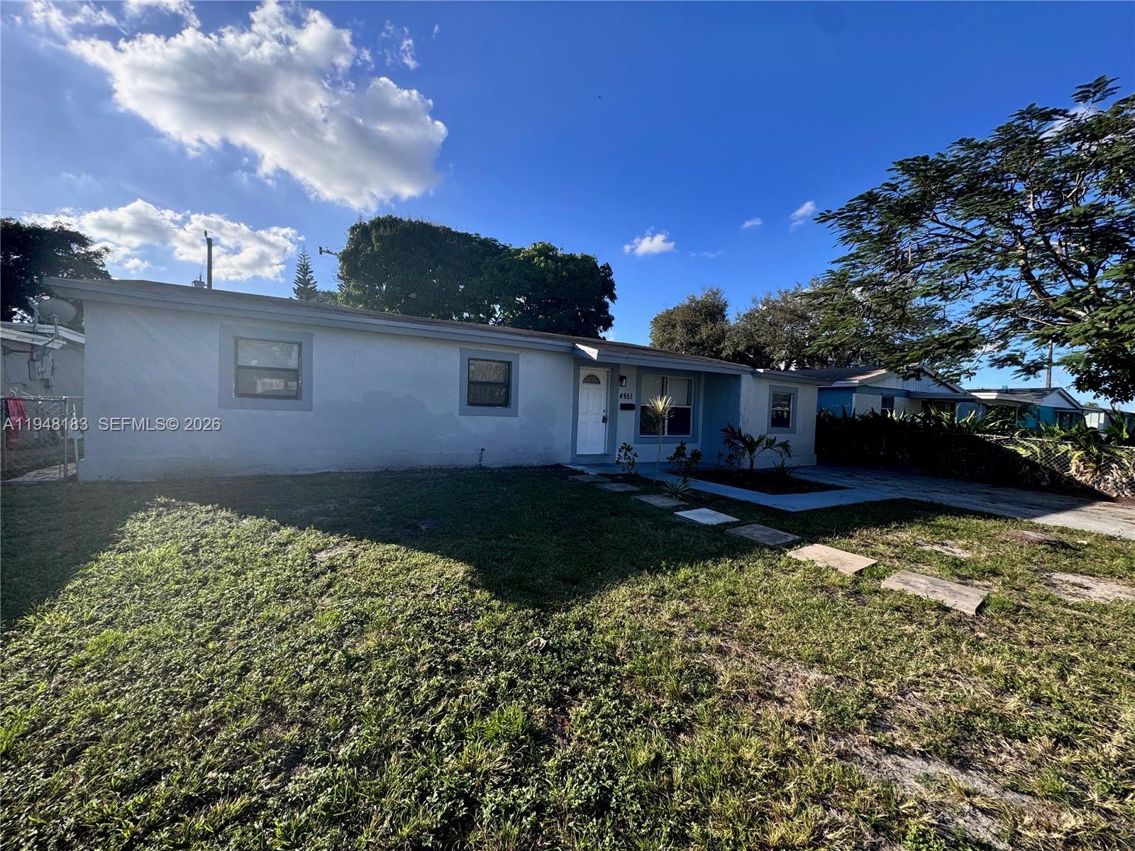 Well-appointed guest bedroom at 4851 44th Ave - Home in Dania Beach