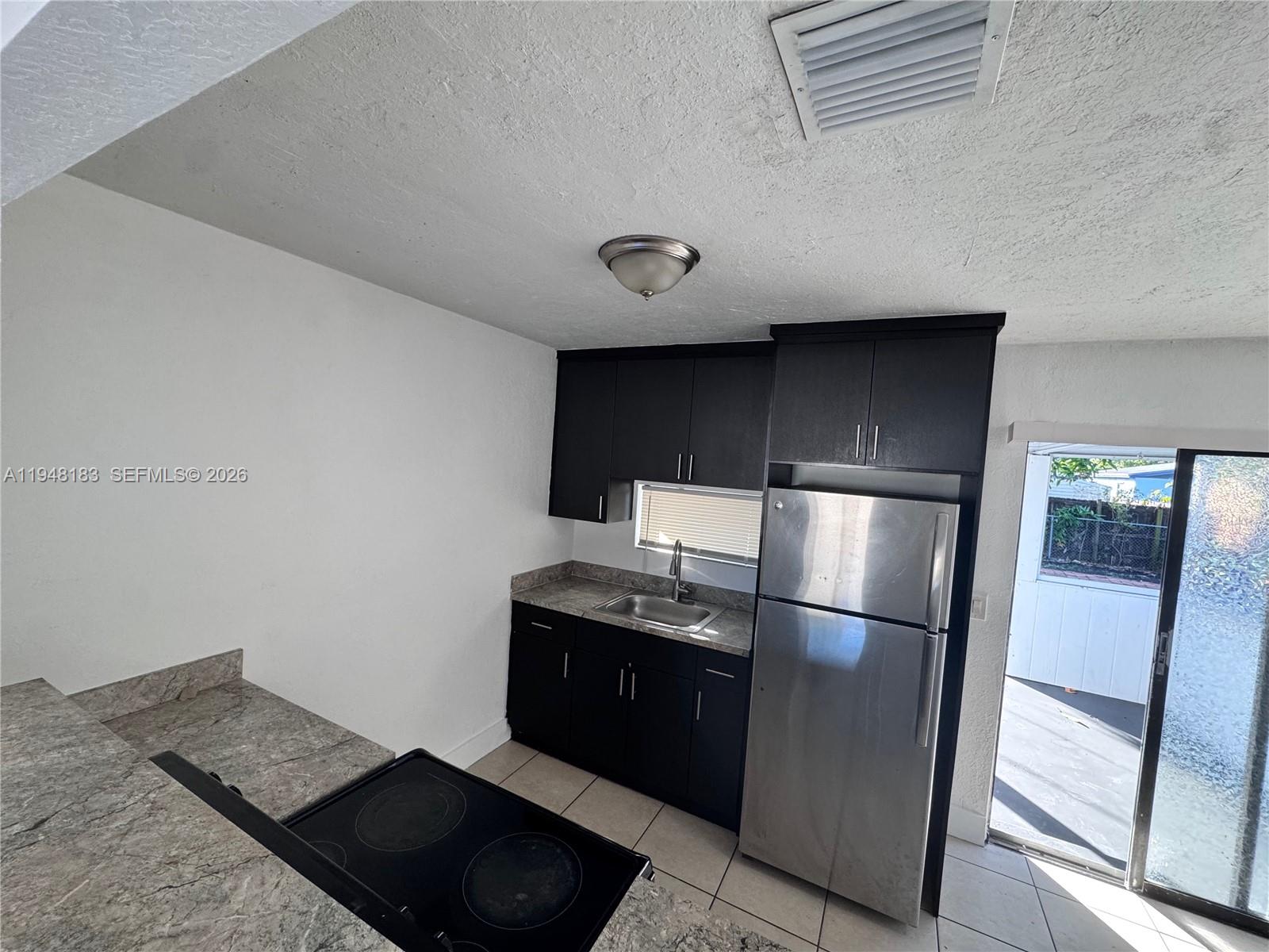 Well-appointed guest bedroom at 4851 44th Ave - Home in Dania Beach
