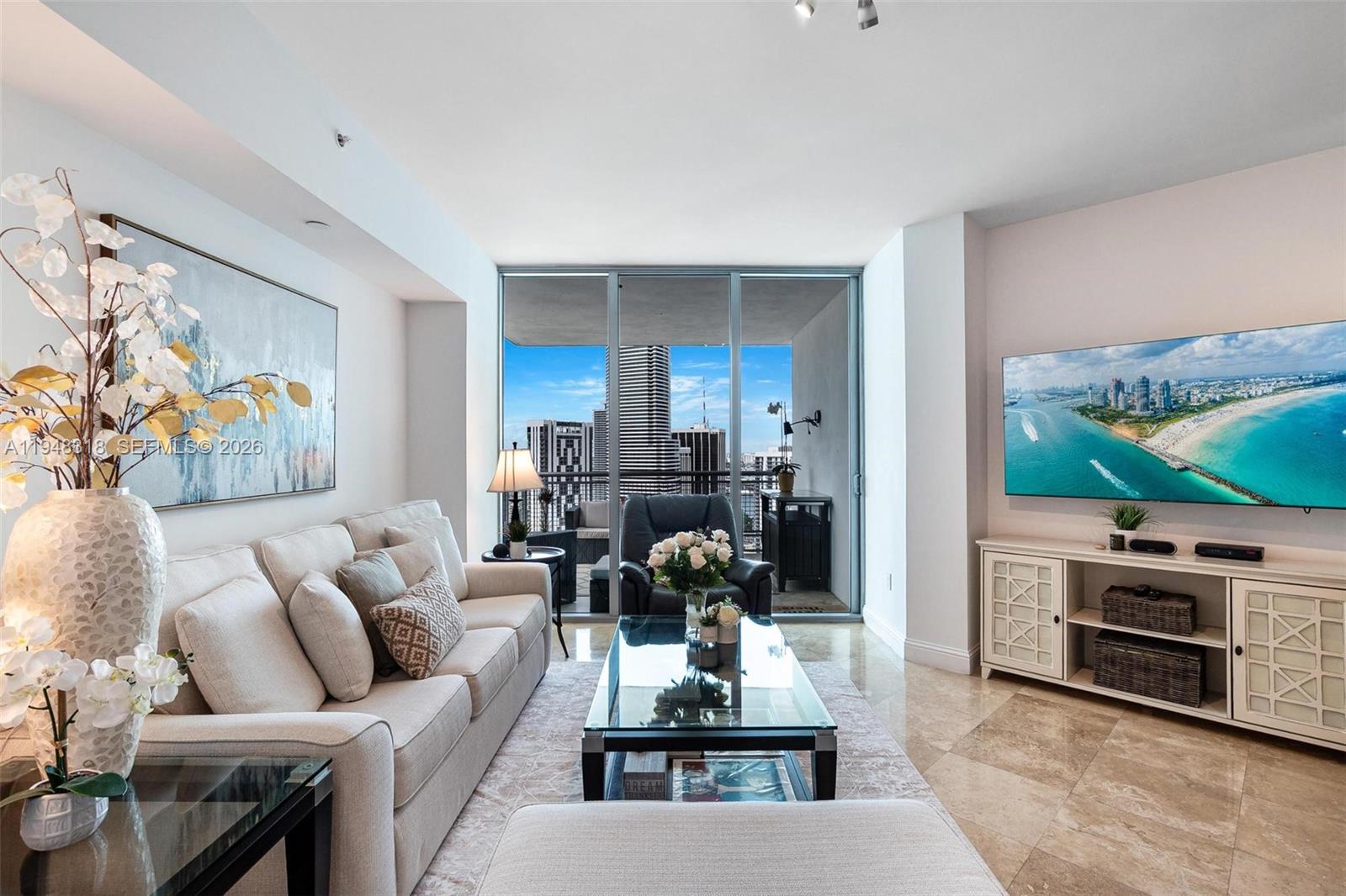 Impeccable 2/2 at Wind by Neo, marble floors and north east exposure offering views of the skyline and the bay.