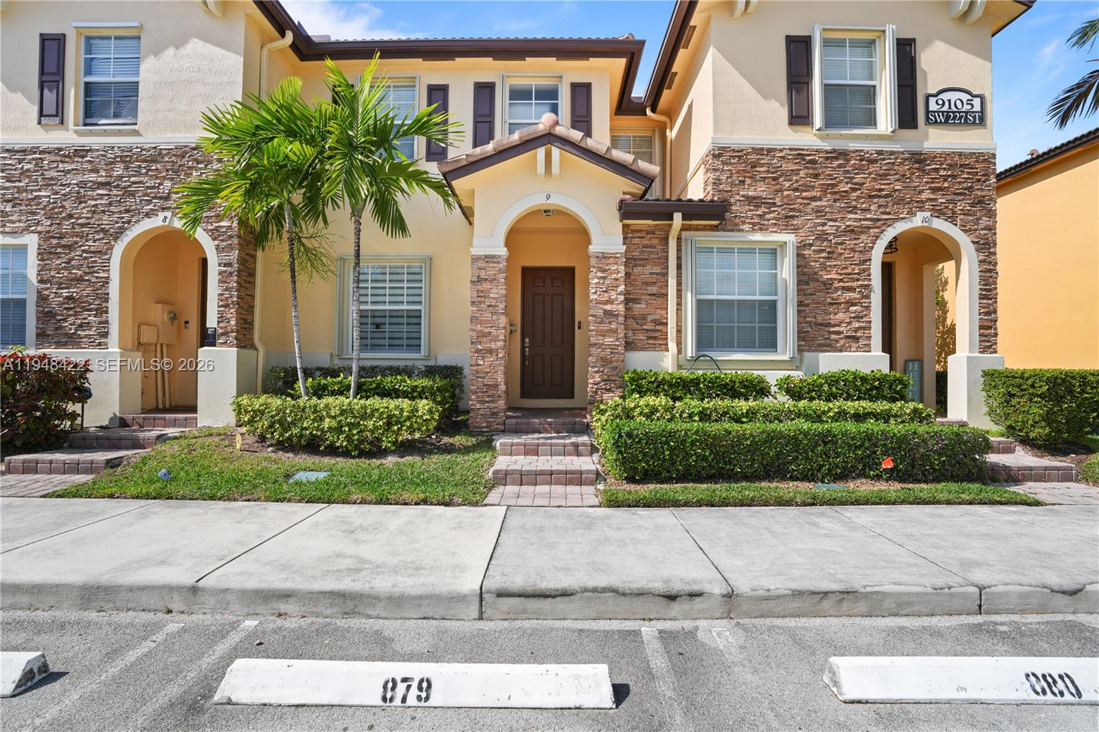 SPACIOUS TOWNHOME IN THE DESIRABLE ISLES AT BAYSHORE COMMUNITY!Wonderful residence in this sought-after community. As you walk in, you enter into your separate living area that flows into a large, open kitchen featuring granite countertops, stainless steel appliances, a brand-new refrigerator, abundant cabinetry, and a pantry. Large family room offers ample space for dining and entertaining with friends and family with a convenient half bath for guests. Upstairs, you’ll find two spacious en-suite bedrooms, each with walk-in closets, along with a new washer and dryer, linen closets, and elegant dark laminate flooring throughout. Additional highlights include accordion shutters for peace of mind, a newer A/C system for year-round comfort, and a private patio, ideal for BBQs, relaxing, or playtime including a new Shed for storage! Don’t miss the opportunity to own this wonderful townhome, schedule your showing today!