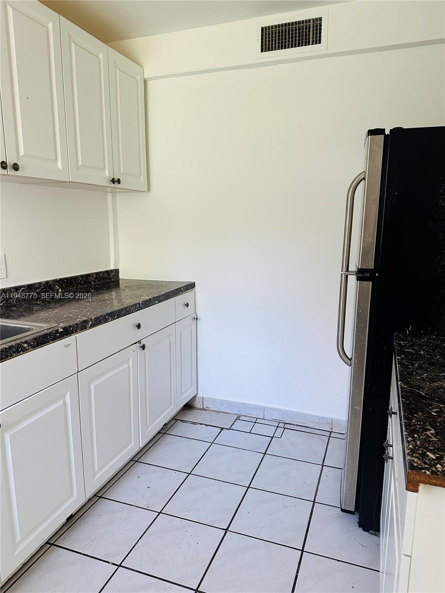 Open-concept living area at 4548 33rd Ave - Home in Dania Beach