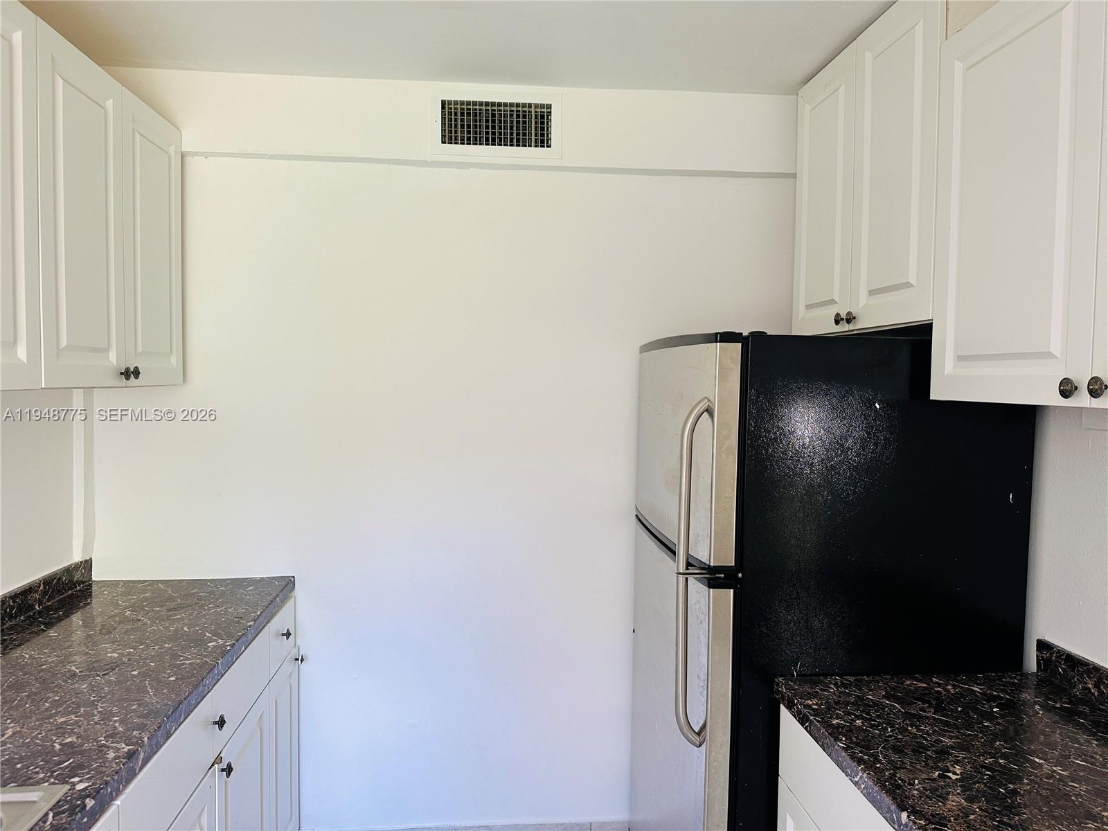 Modern kitchen with designer features at 4548 33rd Ave - Home in Dania Beach