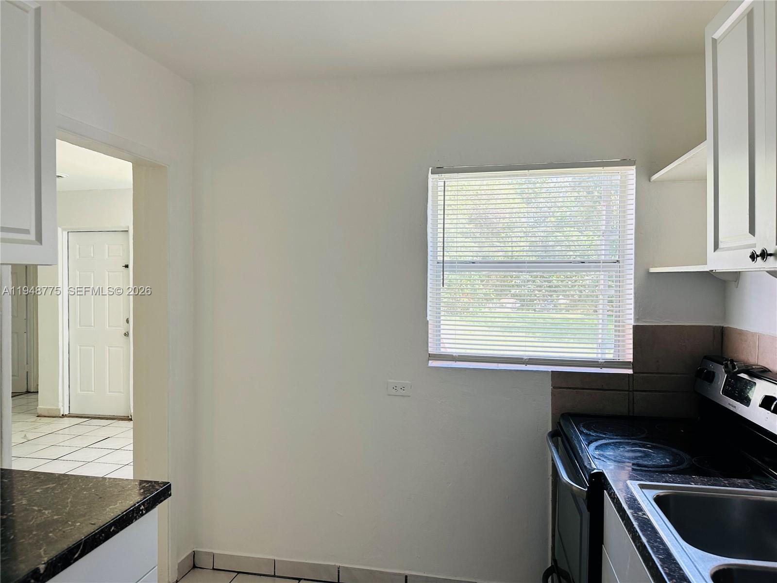 Elegant master bedroom retreat at 4548 33rd Ave - Home in Dania Beach