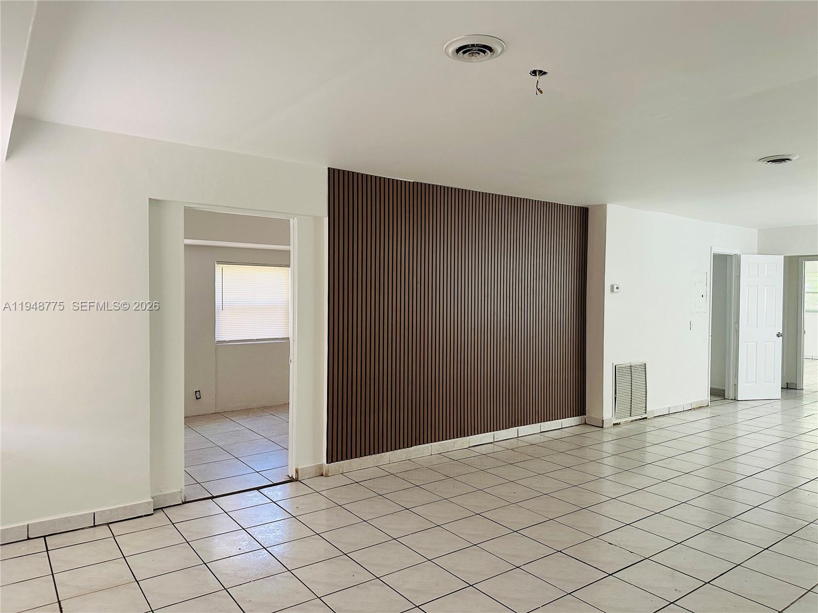 Open-concept living area at 4548 33rd Ave - Home in Dania Beach
