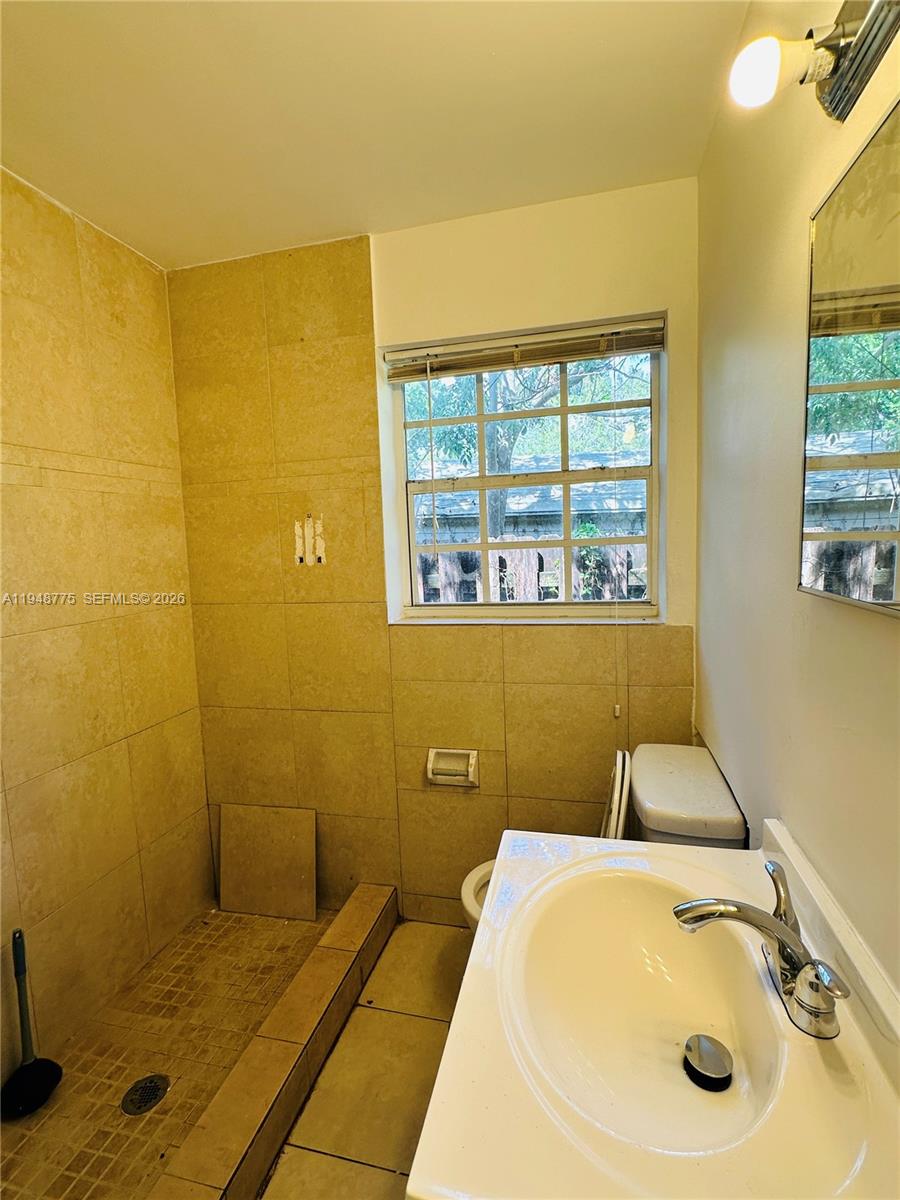 Well-appointed guest bedroom at 4548 33rd Ave - Home in Dania Beach