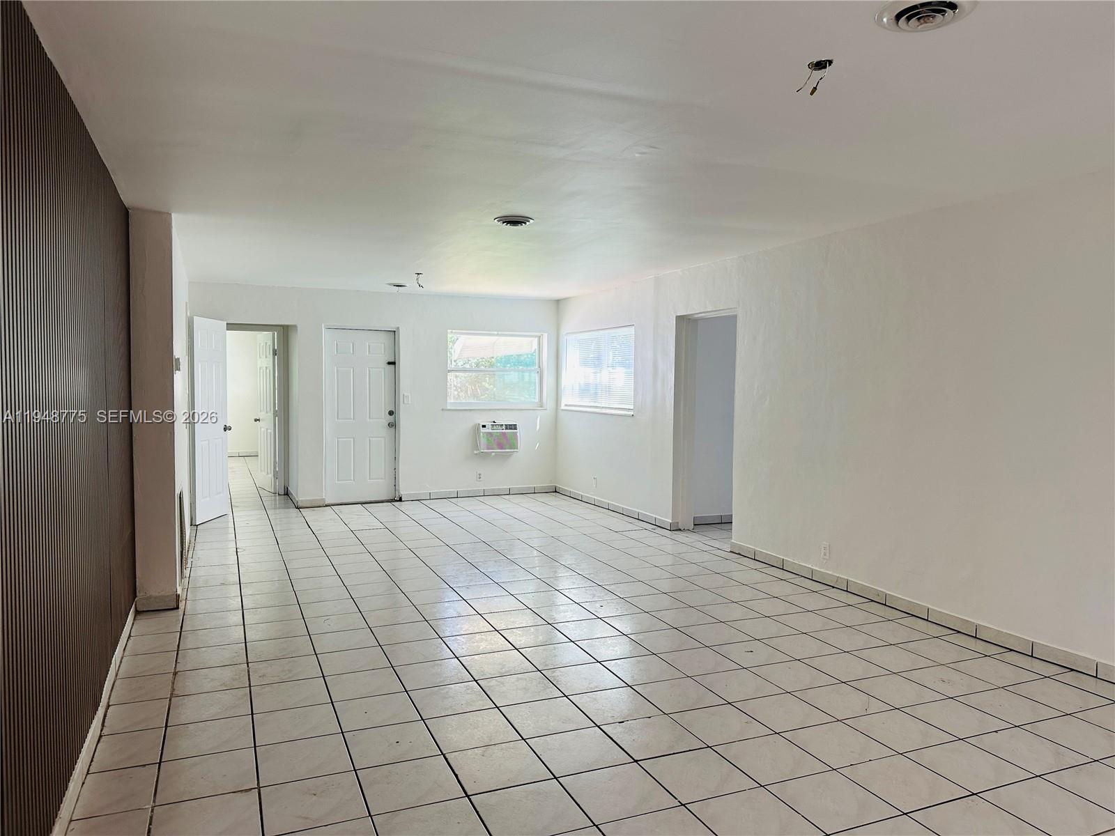 Modern kitchen with designer features at 4548 33rd Ave - Home in Dania Beach