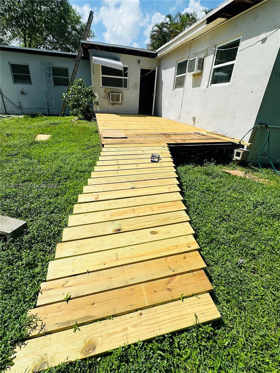 Open-concept living area at 4548 33rd Ave - Home in Dania Beach