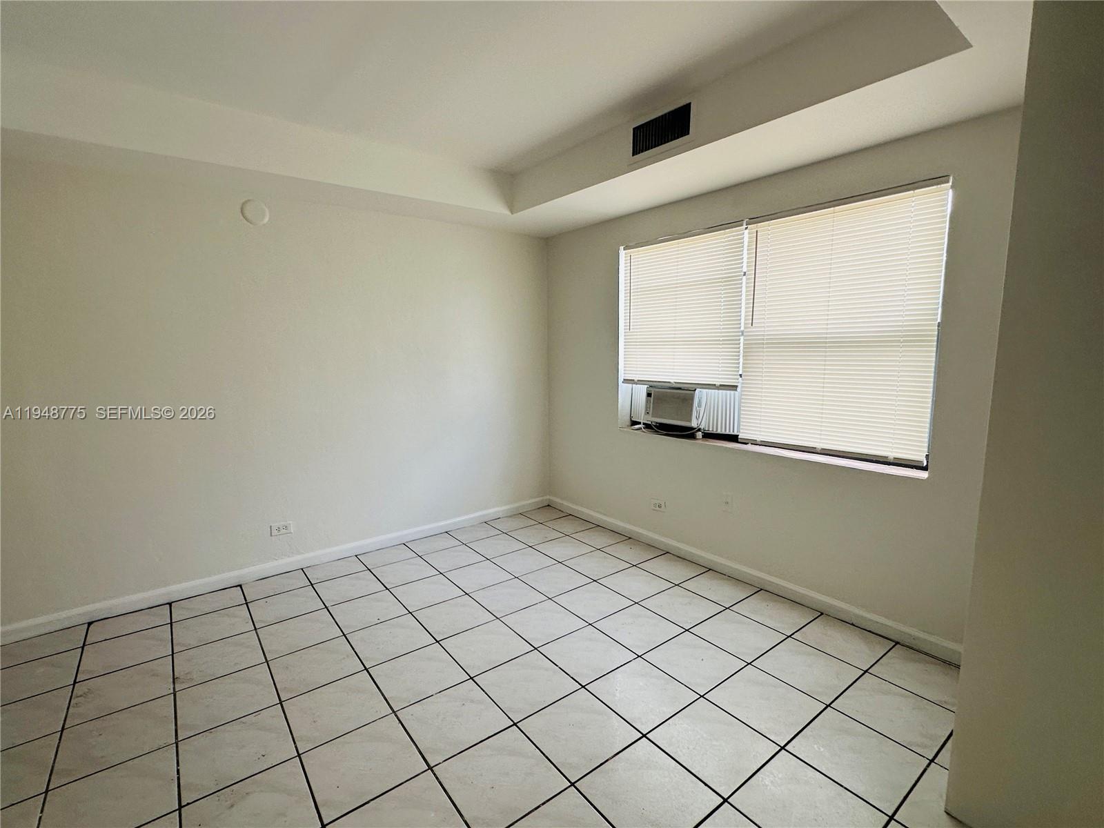 Well-appointed guest bedroom at 4548 33rd Ave - Home in Dania Beach