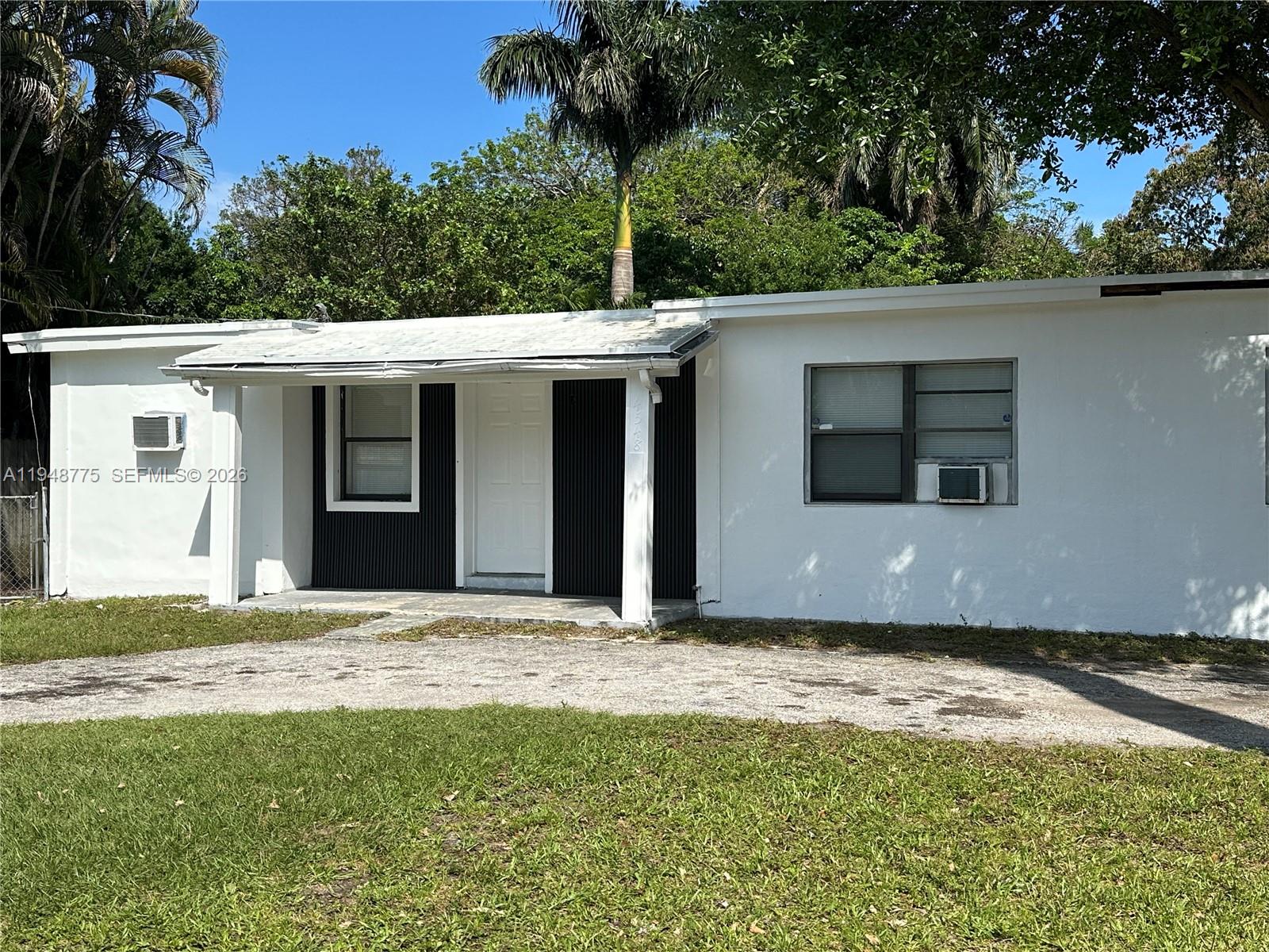 Well-appointed guest bedroom at 4548 33rd Ave - Home in Dania Beach