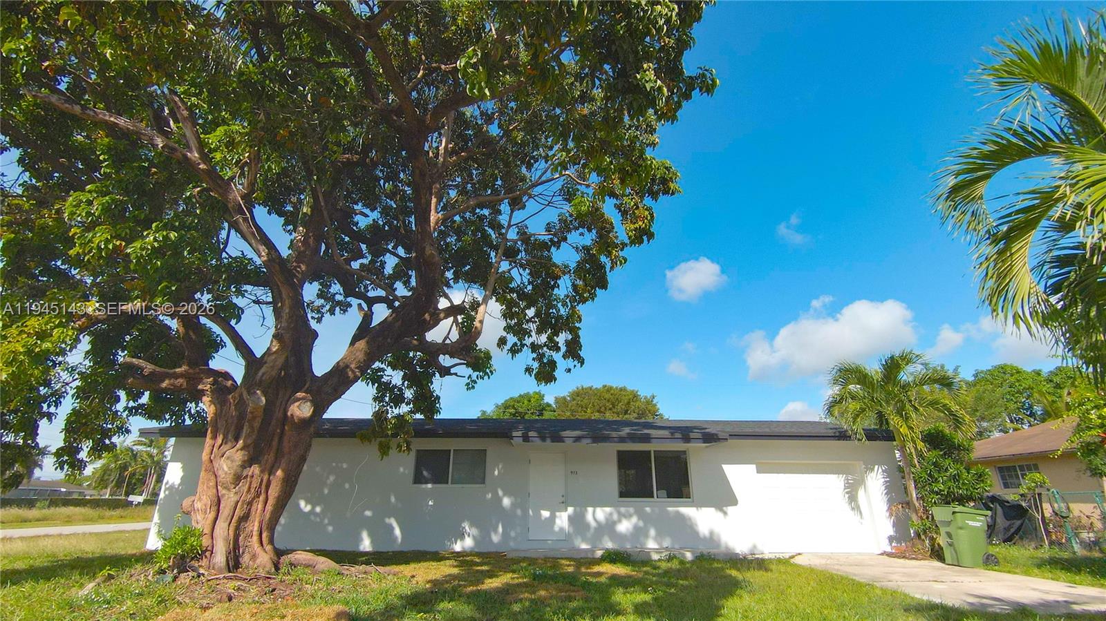 This well-maintained property features 4 bedrooms and 2.5 bathrooms.  Roof installed  2025 with permits. Impact windows and impact doors, all permitted. Spacious 10,000 sq. ft. lot offering excellent potential for outdoor living, expansion, or additional improvements. Great opportunity in a rapidly growing area.