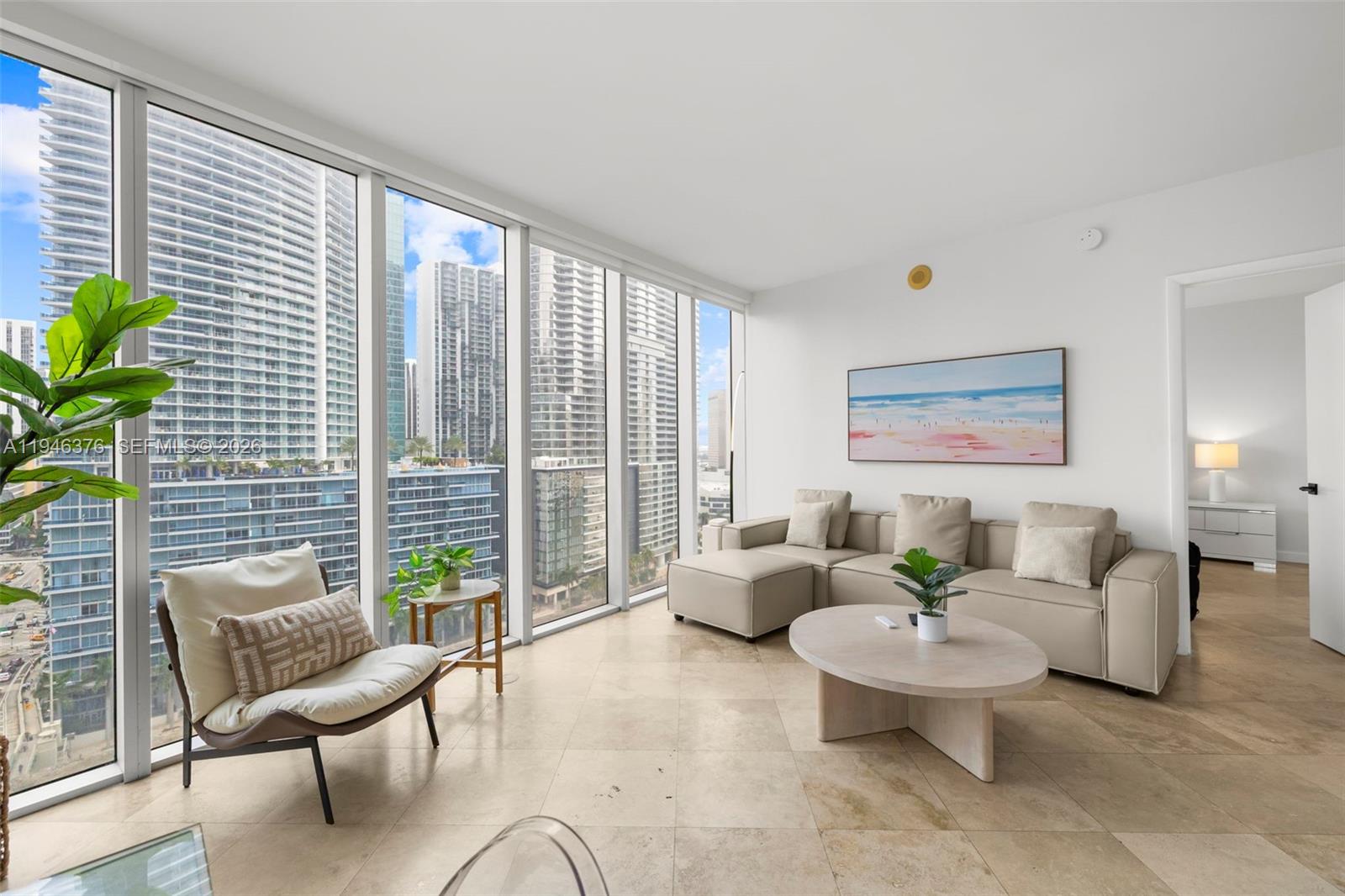 Experience elevated Miami living in this beautifully furnished 2-bedroom, 2-bath corner residence at ICON Brickell Tower 3 (W Miami). Spanning approximately 1,286 square feet, Unit 1804 offers a bright, open layout framed by dramatic floor-to-ceiling glass with sweeping views of Biscayne Bay, the Miami River, and the iconic skyline. The residence features custom lighting, built-out closets, designer mirrors, and fully remodeled spa-style bathrooms, while the sleek kitchen is equipped with premium Sub-Zero appliances, granite countertops, and a modern glass cooktop, plus in-unit laundry for added convenience. Residents enjoy world-class amenities including a 300-foot infinity-edge pool, full-service spa, state-of-the-art fitness center, signature dining, valet, concierge, and exclusive W Hotel services. Ideally located in the heart of Brickell just steps from Brickell City Centre, top dining, shopping, and nightlife, with short-term rentals permitted—making this an exceptional opportunity for a primary residence, luxury vacation home, or high-performing investment.