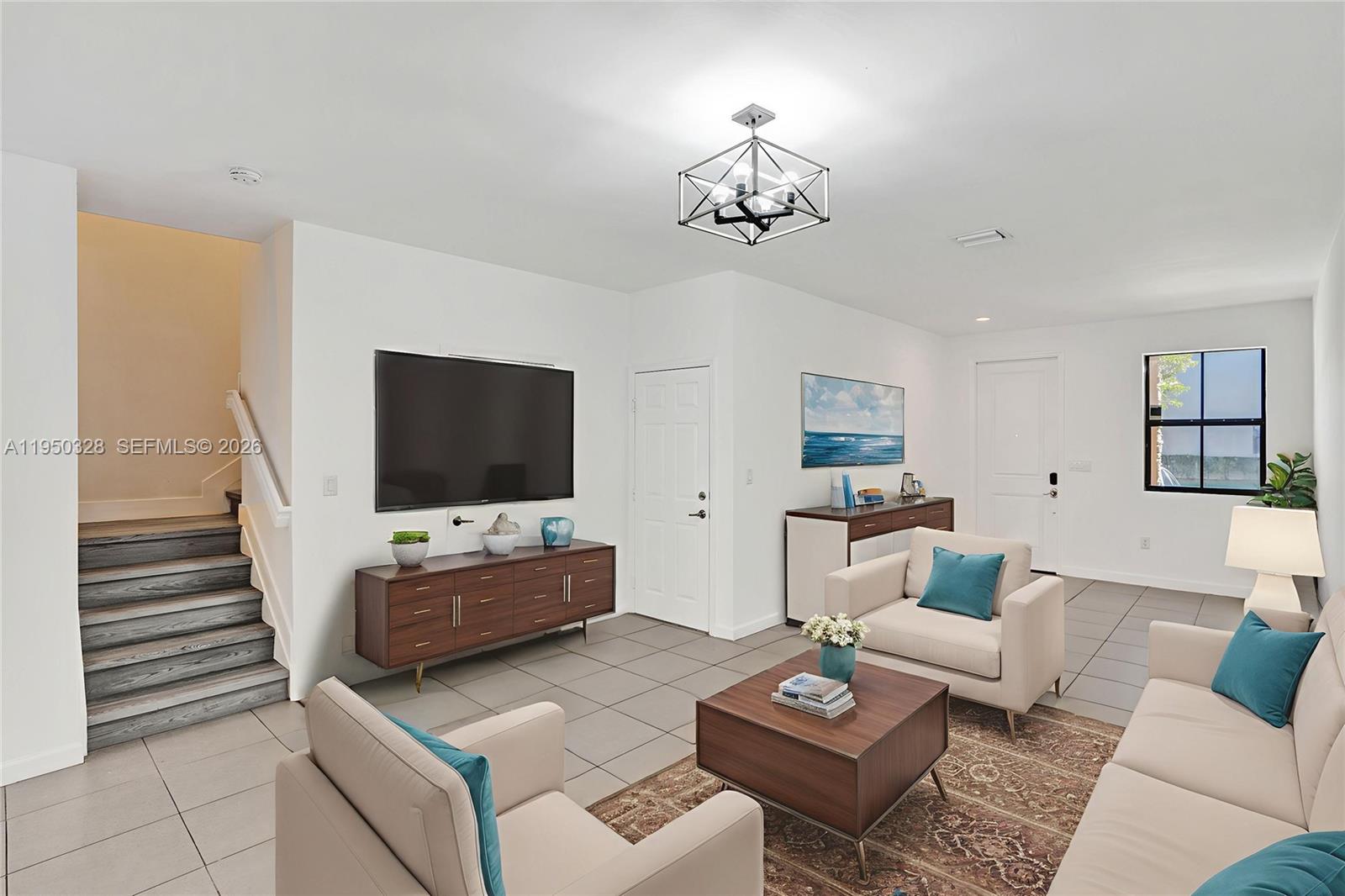 Welcome to your dream home in the beautiful community of Artesa! This stunning home features 3 bedrooms, 2.5 bathrooms, and a 1 car garage. The modern kitchen boasts granite counters, stainless steel appliances, and tile flooring. Upstairs, you'll find vinyl floors for easy maintenance. Primary suite is spacious with tray ceilings, a walk-in closet, and a luxurious bath with dual sinks and a glass-enclosed shower. Laundry room is located upstairs for your comfort and convenience. Enjoy resort-style living with access to a community pool, kids playground, basketball court, volleyball court, and a fully equipped gym. Feel safe and secure with 24/7 security in this gated community. Located just off exit 9 of the turnpike, this home is conveniently close to shopping, restaurants, and all the amenities you could ask for. Don't miss out on this incredible opportunity to live in luxury.