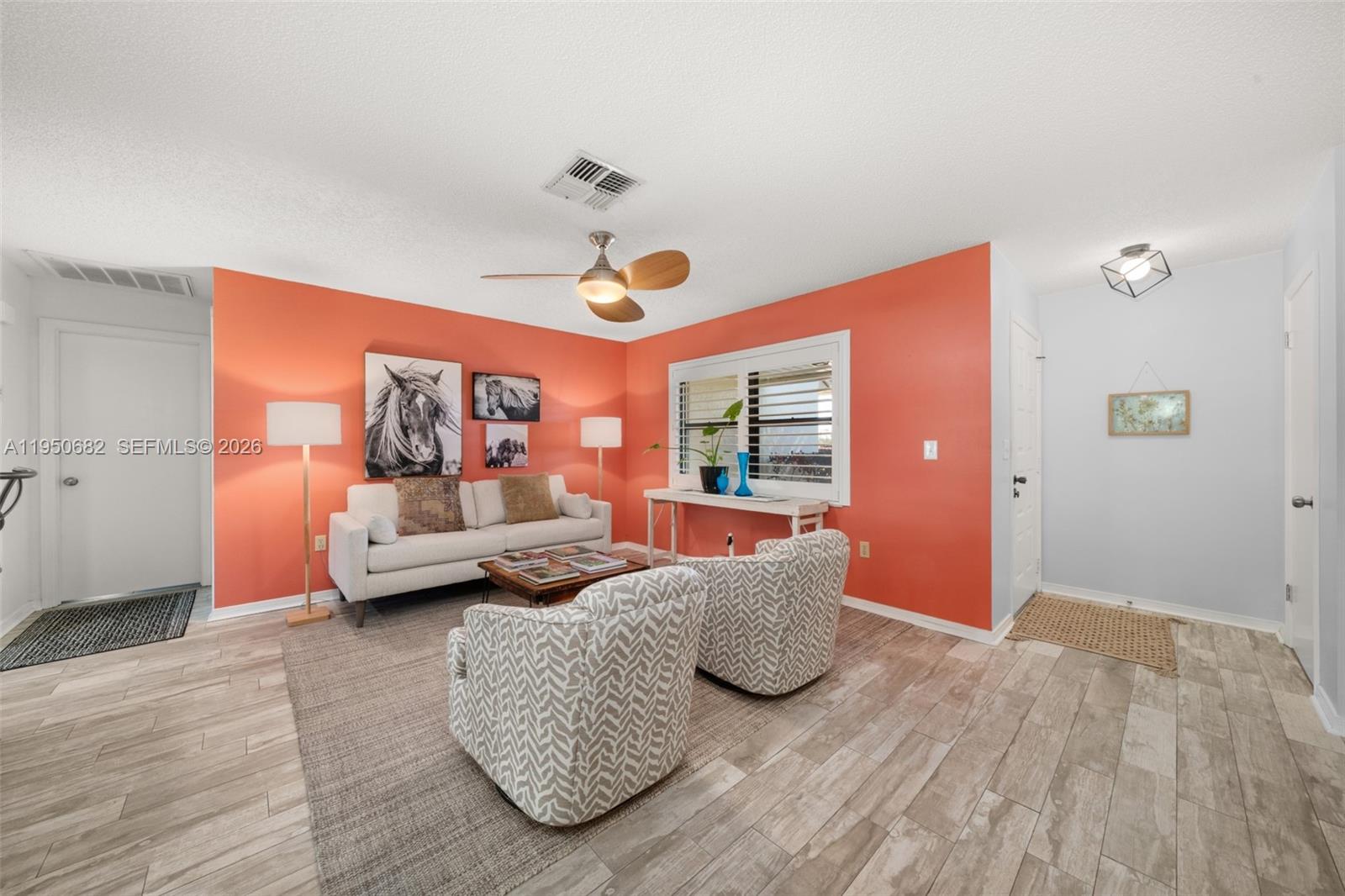Open-concept living area at 319 Grove - Condo in Avon Park