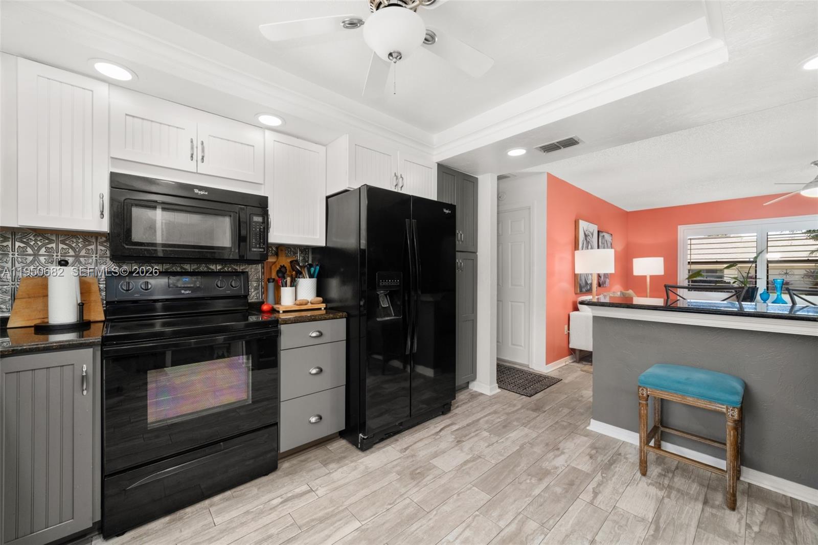 Open-concept living area at 319 Grove - Condo in Avon Park