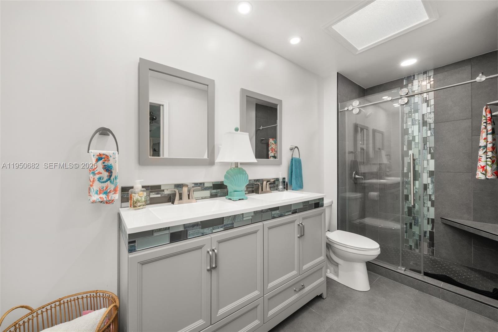 Designer master bathroom at 319 Grove - Condo in Avon Park