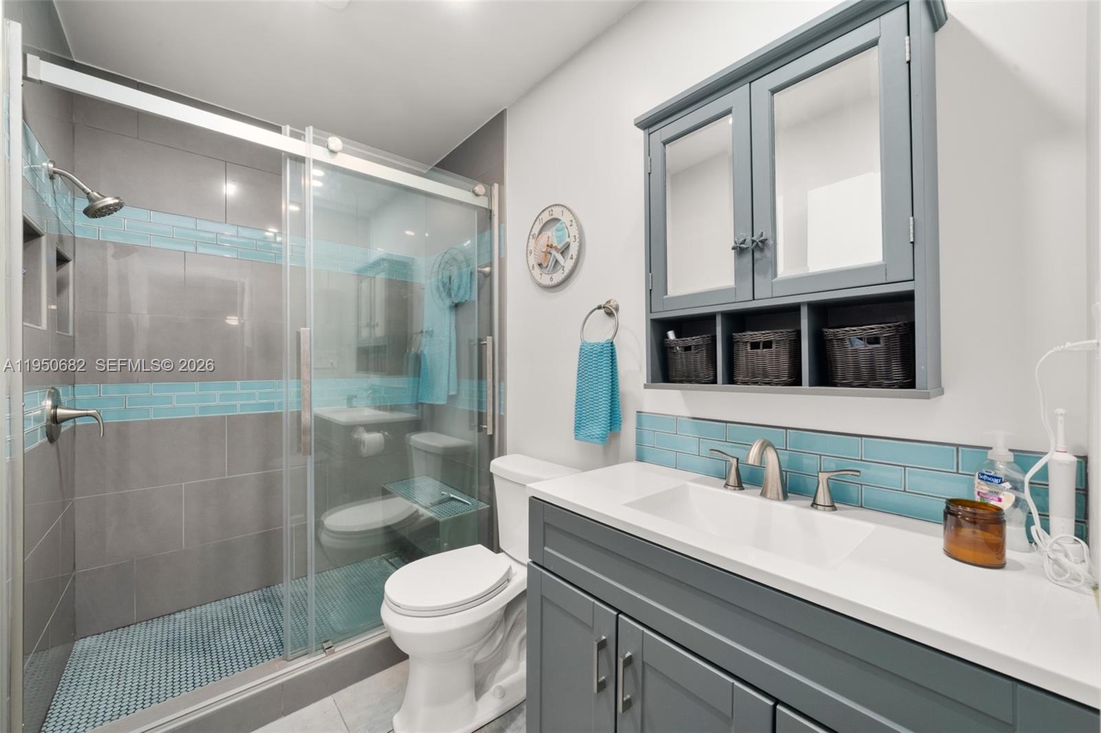 Designer master bathroom at 319 Grove - Condo in Avon Park