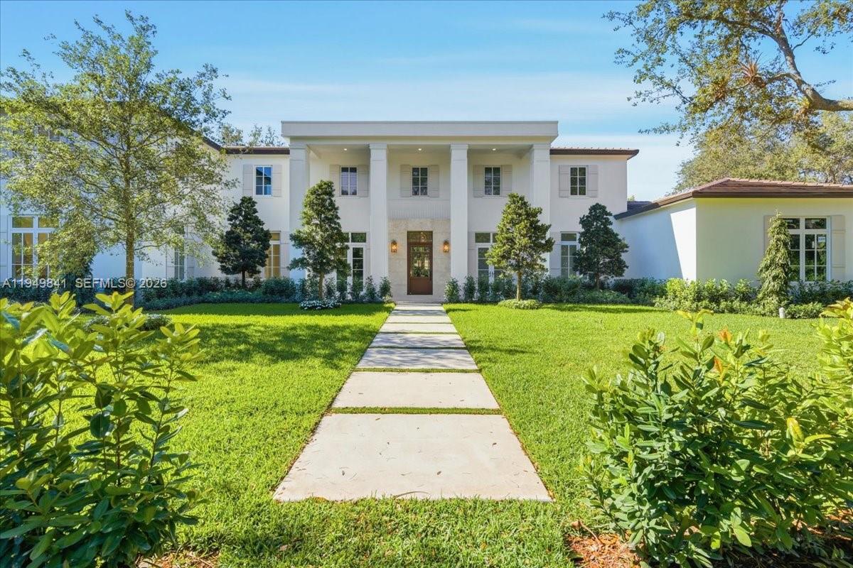 NEW CONSTRUCTION- Southern Colonial estate in North Pinecrest featuring 7 bedrooms, 7.5 bathrooms, and a three-car garage. This elegant residence blends traditional architecture with contemporary finishes, offering soaring ceilings, porcelain floors, custom cabinetry, and high-end fixtures throughout. Gourmet kitchen ideal for entertaining. Outdoor living includes a pool and BBQ area. Located in a family-friendly neighborhood within one of Pinecrest’s most desirable pockets, walking distance to top-rated schools and near Wayside Market.Adjusted square footage: 6,538, Living Square Footage: 6,504 Total Square footage: 7,671