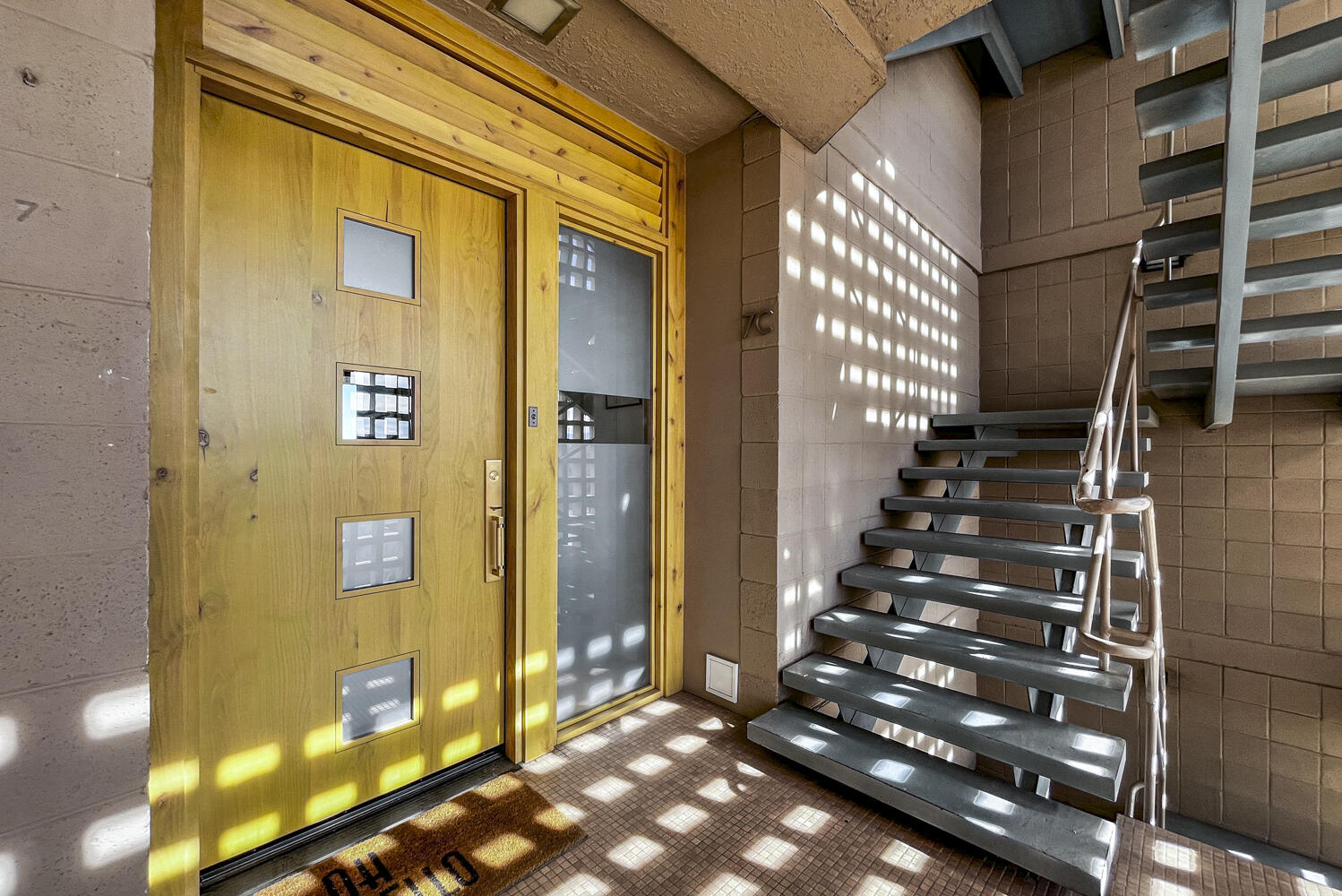 The optimum in mid-century modern high-rise living at Alcalde, with elevator service, community pool & covered parking! Welcome to unit 7-C! A recently-completed far-reaching renovation results in a sleek environment that is warm & exceedingly livable. Floor-to-ceiling sliding doors in liv rm open to cov balcony w/original tile & panoramic views east, west & north. The kitchen is a genius of design w/integrated SubZero fridge/freezer & BlueStar induction range/oven that will have you chartreuse with envy. Expanded primary suite w/dressing rm & bath; 2 add'l bedrms share a full bath. Small details make a big impact such as wall & floor tile + an astute use of color throughout. Updates & upgrades include the majority of windows, HVAC, water heater, electrical panel, appliances & flooring.