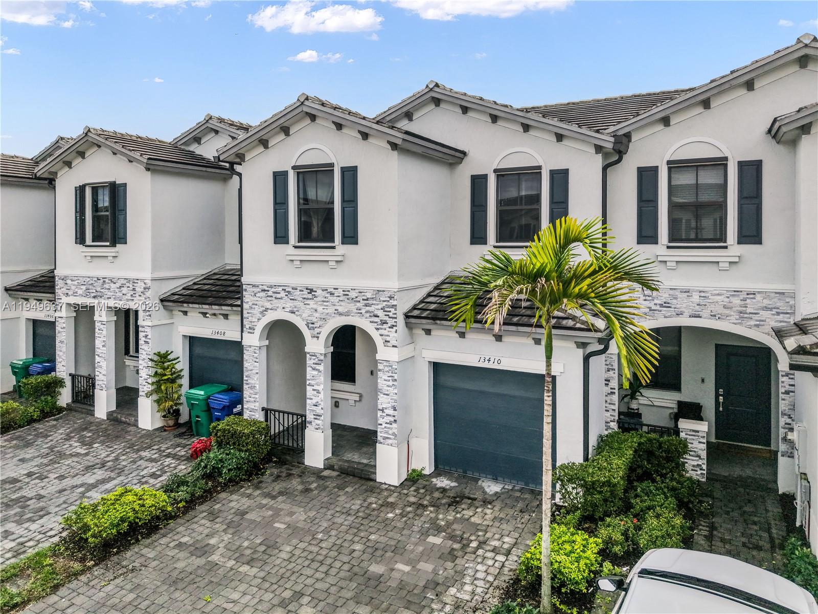 Discover modern living in this beautifully maintained 3-bedroom, 2.5-bathroom townhouse located in the desirable gated community of Pine Vista in Homestead, which is currently the fastest growing municipality in Miami-Dade County. Built in 2022, this spacious residence offers 1,827 square feet of living space under air, thoughtfully designed for comfort, functionality, and today’s lifestyle.The open-concept main level features a bright living and dining area that flows seamlessly into the contemporary kitchen, ideal for both everyday living and entertaining. Upstairs, the generously sized bedrooms provide privacy and comfort, including a well-appointed primary suite with an en-suite bathroom with a spacious stand up shower. A convenient half bath on the main level adds extra ease for guests, while the 1-car garage offers secure parking and additional storage. Enjoy resort-style amenities right outside your door, including a gated entrance, community pool, clubhouse, exercise room, and scenic walking and biking trails. Whether you’re relaxing at home or taking advantage of the community’s recreational offerings, this townhouse delivers the perfect balance of modern convenience and active living. Centrally located near shopping, dining, and major roadways, this move-in-ready home is an excellent opportunity to own a newer construction townhouse in one of Homestead’s growing communities.