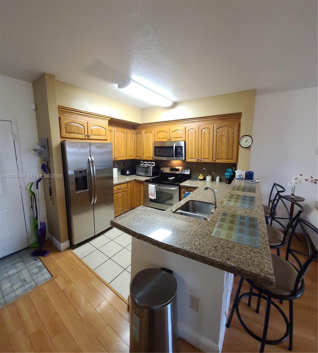 INVESTMENT OPPORTUNITY Spacious and bright 2-bedroom, 2-bath condo in the desirable Paradise Pointe community. Currently rented for $2,100 per month until October 31, 2025 to excellent tenants, making it a turnkey investment with immediate cash flow. The Apartment features stainless steel appliances, granite countertop, private balcony and washer & Dryer in the unit. Community amenities include tennis courts, community pool, and brand-new washing machines and dryers for added convenience, guarded gate and FOB building entrance. Don’t miss this opportunity to own a worry-free investment in a great location.