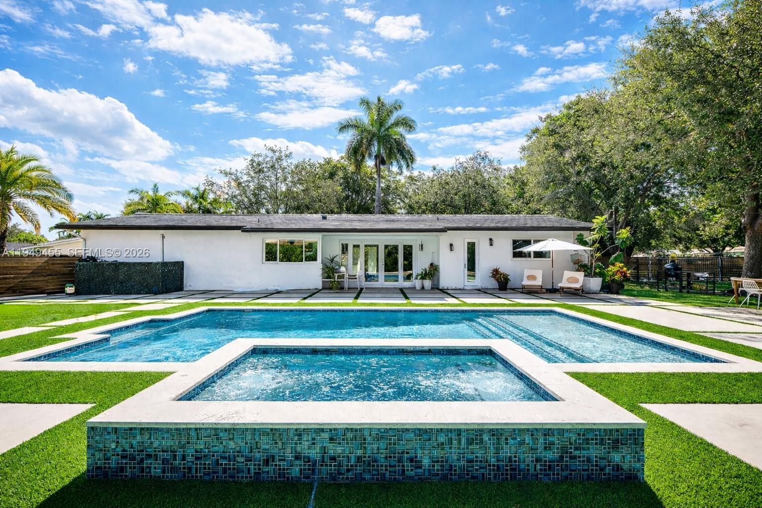 This beautifully renovated home offers modern comfort and a true sense of community, with access to nearby parks, scenic water views, fishing areas, farmers markets, and golf cart friendly neighborhood streets that host seasonal community events throughout the year. Light filled living spaces feature impact windows and doors, warm finishes, and a functional layout ideal for everyday living and entertaining. The open kitchen and main living areas flow seamlessly to a resort style backyard, highlighted by a sparkling pool and elevated spa, creating a private setting for relaxing or hosting family and friends. Conveniently located near top rated schools, waterfront parks, shopping, and dining, this move-in-ready home blends lifestyle, comfort, and timeless appeal in one of Palmetto Bay’s most desirable neighborhoods: a place where everyday moments turn into lasting memories!