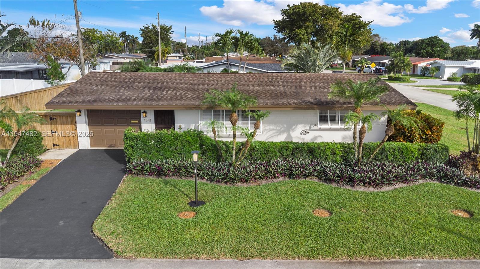 Welcome to this charming, well-maintained single-family home in the desirable in Boulevard Heights neighborhood of Pembroke Pines. Located on a 7375 sq. ft corner lot, in a luxuriously landscaped settingThis cozy residence boasts 2 bedrooms, 1 bathroom, and a 1-car garage.Fence all around the backyard for added privacy with a 10 x 10 Shed.Screened Patio.Newer : Fridge, Electric Range, Microwave, Dishwasher, Washer and Dryer. Garage Door opener. Bahama ShuttersDuctless AC individually controlled. Windows drapes and blinds.Tile flooring. Freshly painted in and out. Ready to move in FURNISHED TURN KEY. If you were thinking of a larger house, this house is offering several affordable expansion possibilities for the future, either in terms of converting the garage into a bedroom or by enclosing the Florida room. The lot size also allows for additional parking spaces .HURRY THIS WONT LAST!!!