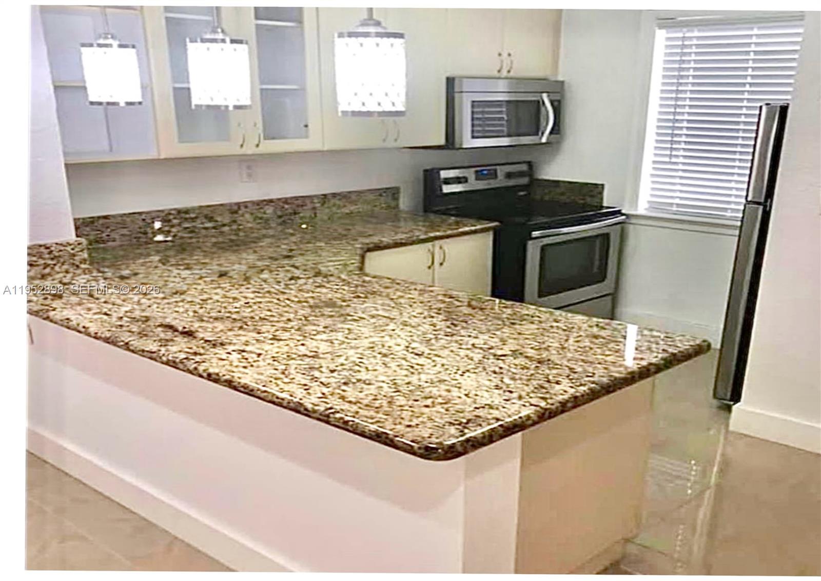 Welcome to this Stunning unit in the heart of Palmetto Bay! This charming & updated 2 bedrooms, 1 Bathroom unit features an open concept kitchen with granite counter top and stainless steel appliances, connects the kitchen, living and dining areas. Updated spa-like bathroom shines with glass enclosed shower. Great gated community. Excellent amenities including pool, children play area and laundry facilities. Conveniently located in Palmetto Bay offering easy access to US-1, Turnpike Old Cutler road, close to the falls, restaurants and shops! A must see!