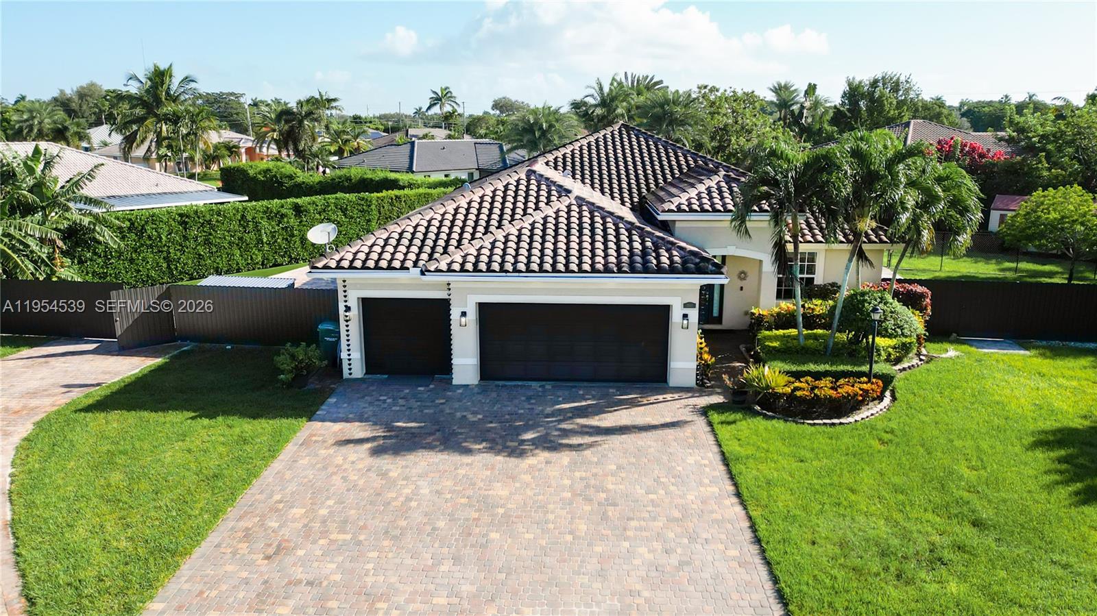 Welcome to this thoughtfully designed home situated on an oversized lot, offering convenient first-floor entry and elegant built-in features that maximize space and functionality. The residence boasts ample storage with custom closet cabinetry and a desirable split-bedroom floor plan, providing both privacy and comfort.The well-appointed kitchen is equipped with modern conveniences, including an electric range, microwave, and self-cleaning oven—ideal for everyday living and entertaining. Additional highlights include an automatic garage door opener, dishwasher, and essential appliances such as a refrigerator, washer, dryer, and smoke detectors.This home seamlessly combines smart design, comfort, and functionality perfect for today’s lifestyle.