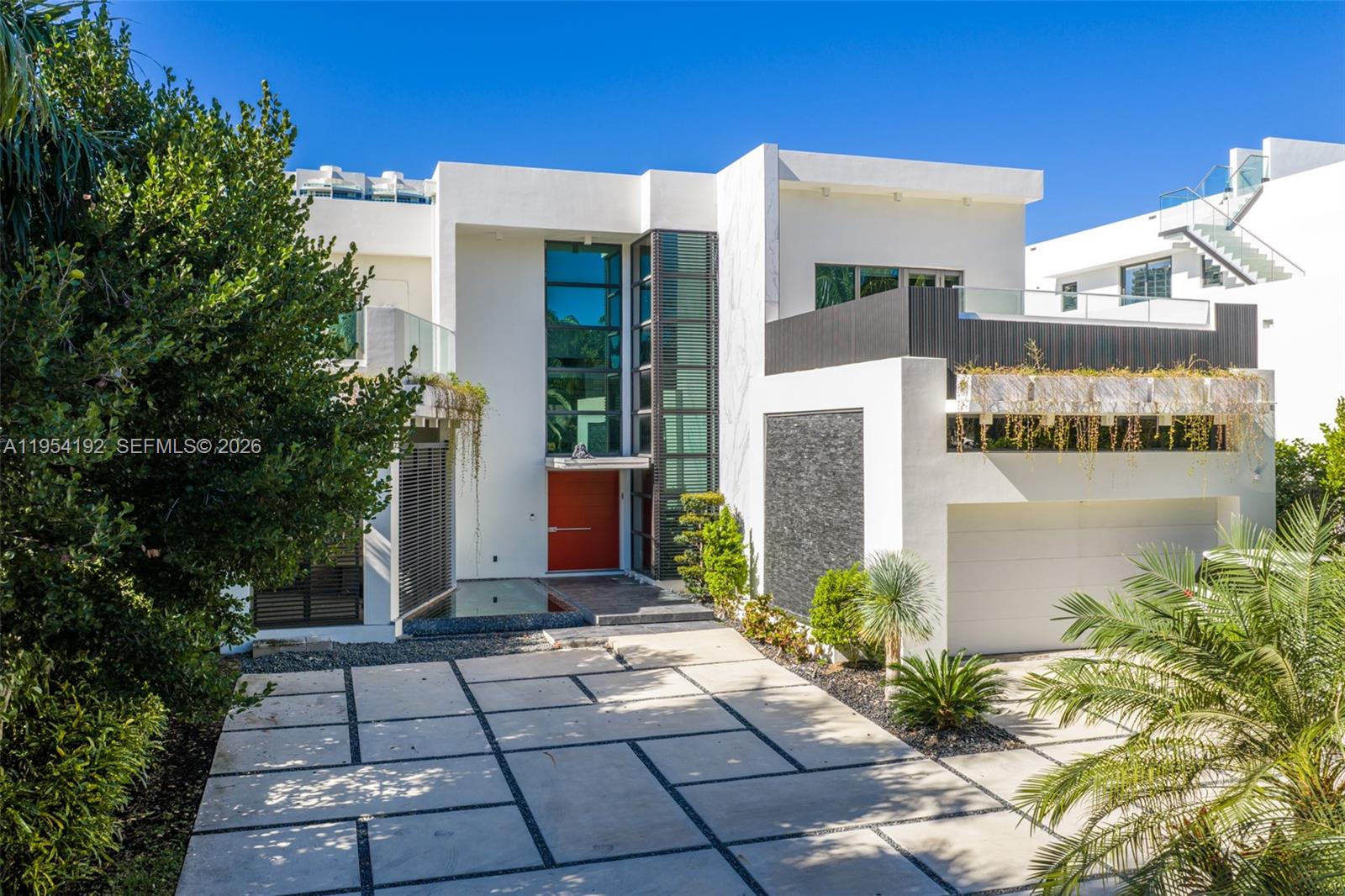 Welcome to 364 Golden Beach Drive, a modern stunner set in one of the most desirable locations within Golden Beach. Positioned along the palm-lined sidewalk and just a short walk to the private beach, this home captures the ideal neighborhood lifestyle. Bright, light, and bold, the residence sits on 75 feet of private waterfront and offers a thoughtful family floor plan with three bedrooms downstairs and three upstairs. Peaceful water views, a turnkey interior, and a neighborhood gym nearing completion make this a rare and effortless opportunity in one of South Florida’s most exclusive communities.