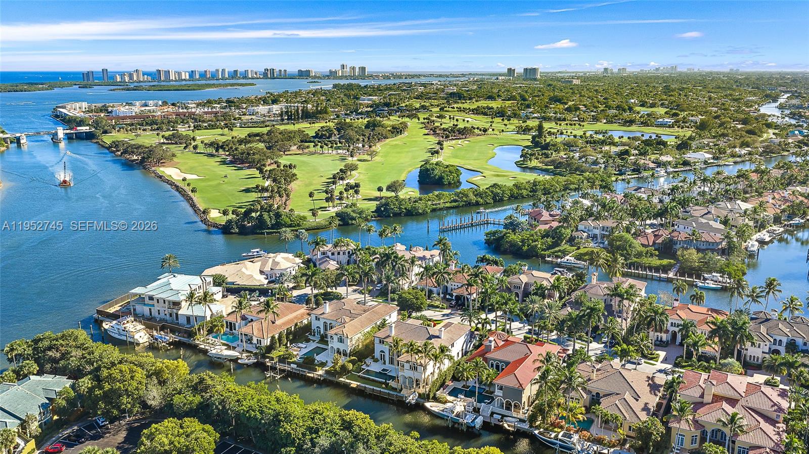 Rarely available waterfront estate priced under $1,000 per square foot! This expansive home offers 90 feet of prime waterfrontage, accommodating up to a 70-foot yacht with no fixed bridges. The backyard was completely reimagined in 2025 with a new heated salt water pool and spa, all new landscaping, hardscaping, and phantom screens. Inside, the home features six en-suite bedrooms, a private office, loft, dedicated storage rooms, and an oversized club room ideal for entertaining. One of the few homes in Harbour Isles with a true four-car garage and proper auto court. Finished with Wolf and Sub-Zero appliances, marble floors, solid wood doors, and full impact windows. Just minutes from the best shopping and dining. This is a must-see opportunity!