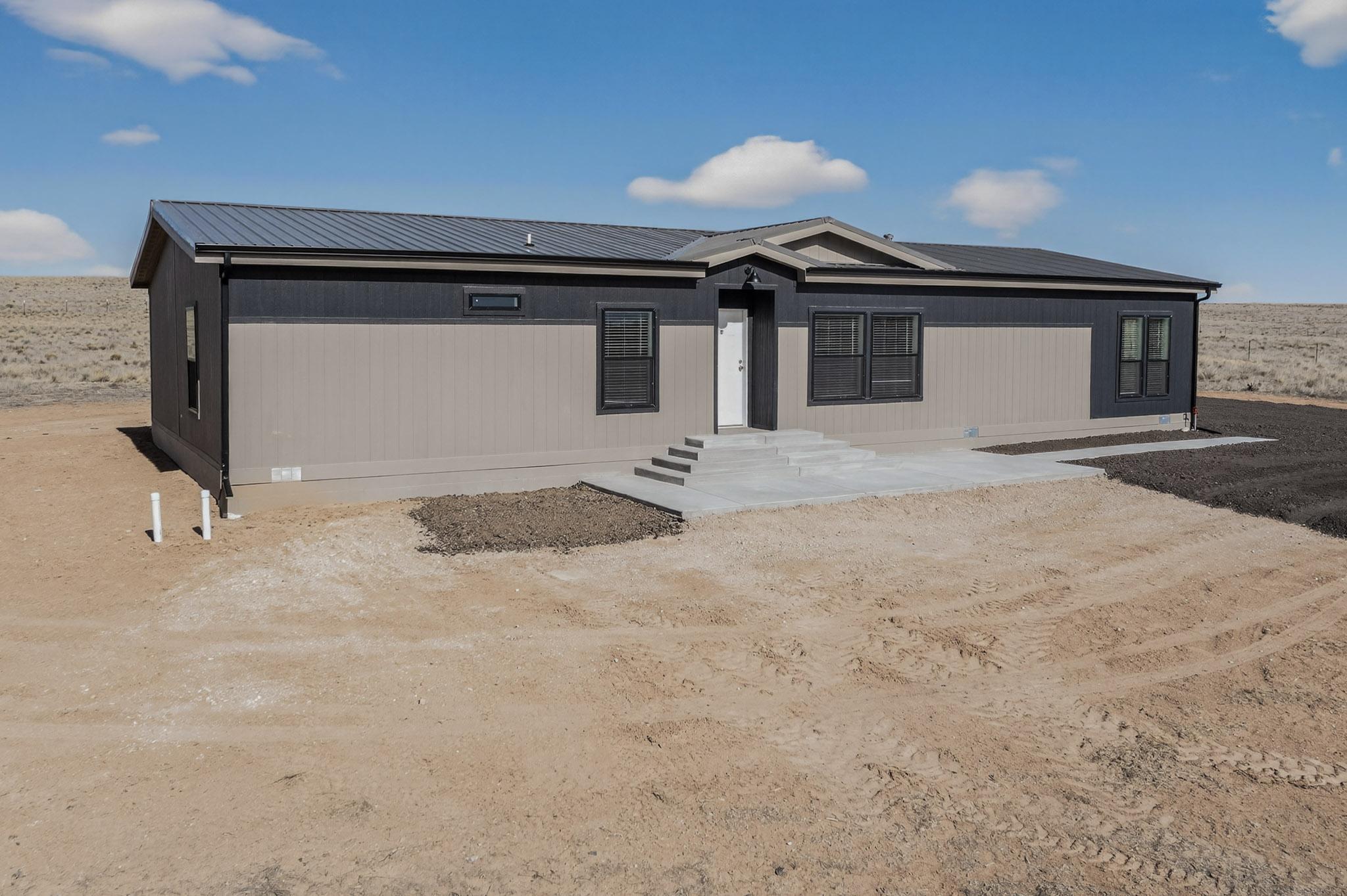 Welcome to your charming new home! This 4 bed 2 bathroom home features an open floor plan all nestled on nearly 4 acres. Perfect for those searching for tranquility and space. This property also features perimeter fencing with an entry gate ensuring privacy and peace of mind. Simply unwind in your own private oasis and embrace the lifestyle of comfort. This home is an ALL ELECTRIC HOME.