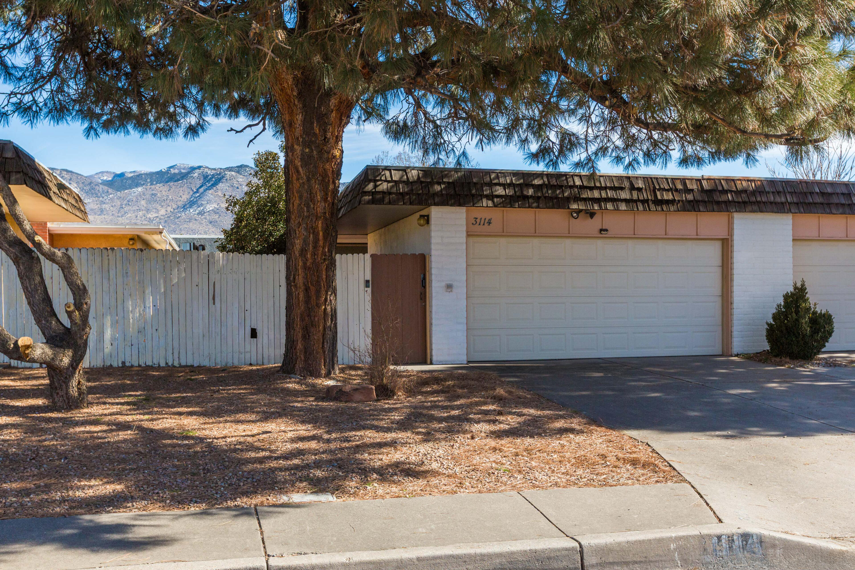 Beautifully maintained and thoughtfully upgraded townhome featuring a updated HVAC system (2021, $13K), vinyl flooring, Pella windows, and updated bathrooms. The kitchen offers plantation shutters, updated appliances, and modern hardware. Additional highlights include a newer roof, a private enclosed courtyard, covered patio, and a beautifully landscaped backyard. The primary suite even includes a dedicated cosmetic area with sink and counter--wow! Located in the desirable NE Heights, this is a home you'll be proud to call your own. Make new memories here before it's gone.