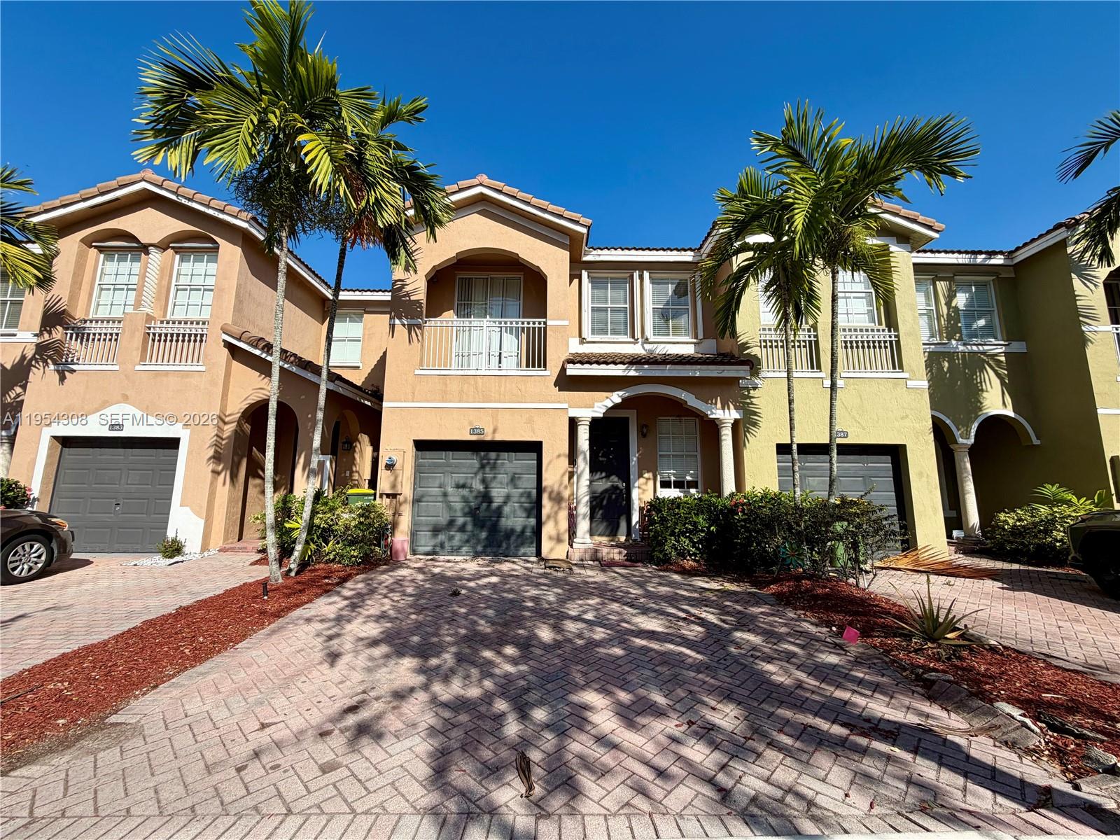 Beautiful townhouse located in a gated community. The first floor features two bedrooms and one full bathroom, while the second floor offers two additional bedrooms and two full bathrooms. Community amenities include a swimming pool and security.