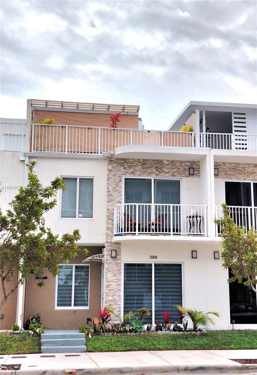 Exquisite Townhouse in the Heart of Homestead! Step into this beautifully designed 4-bedroom, 3.5-bathroom townhouse, where modern elegance meets comfort. Boasting stainless steel appliances, tasteful decor, and ample furnishings. THIS HOME IS TRULY MOVE-IN READY! Enjoy two roof terraces, one partially covered with a BBQ area-perfect for entertaining. Thoughtful details include zebra blinds, as well as light-blackout blinds (some motorized) for added privacy. Exclusive extras are included, such as an electric vehicle charger, advanced security camaras, Alarm, and others. Close to Turnpike, the South Dade Transitway Metrobus, Restaurants, Schools, etc. Homestead is experiencing several major projects, a rapid influx of both new housing and commercial amenities. Excellent for main residence or investment!