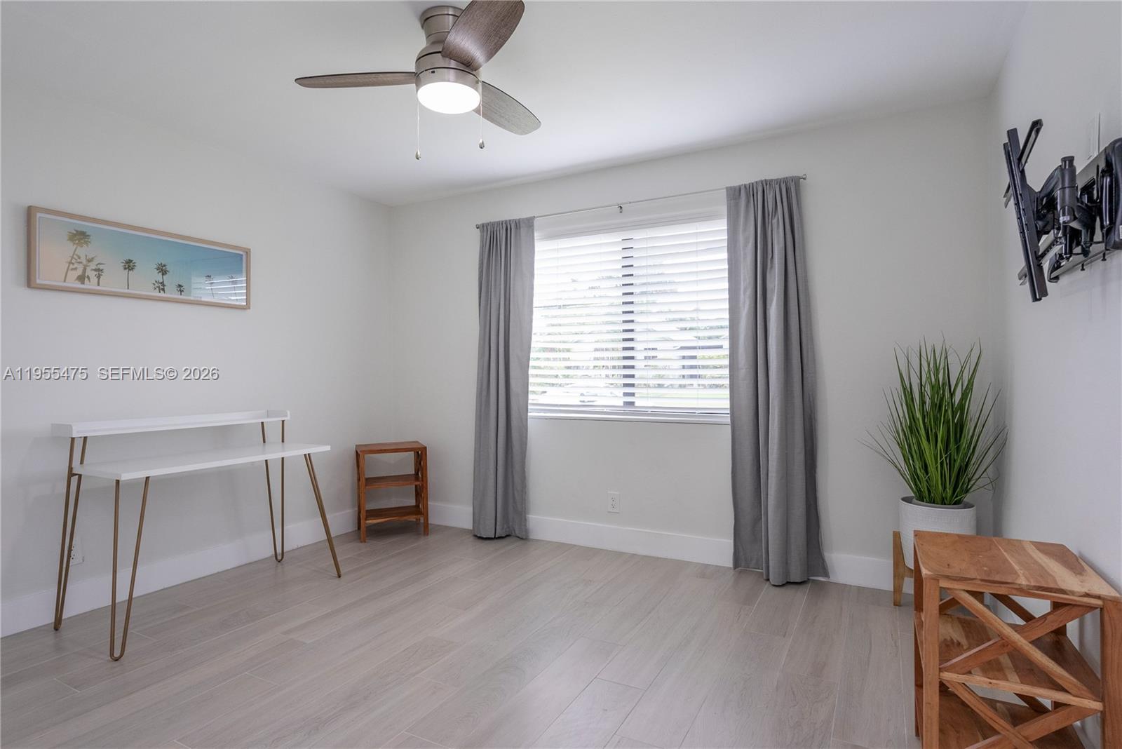 Well-appointed guest bedroom at 510 3rd Ave - Home in Dania Beach