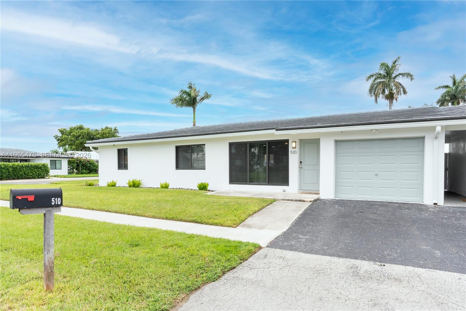 Open-concept living area at 510 3rd Ave - Home in Dania Beach
