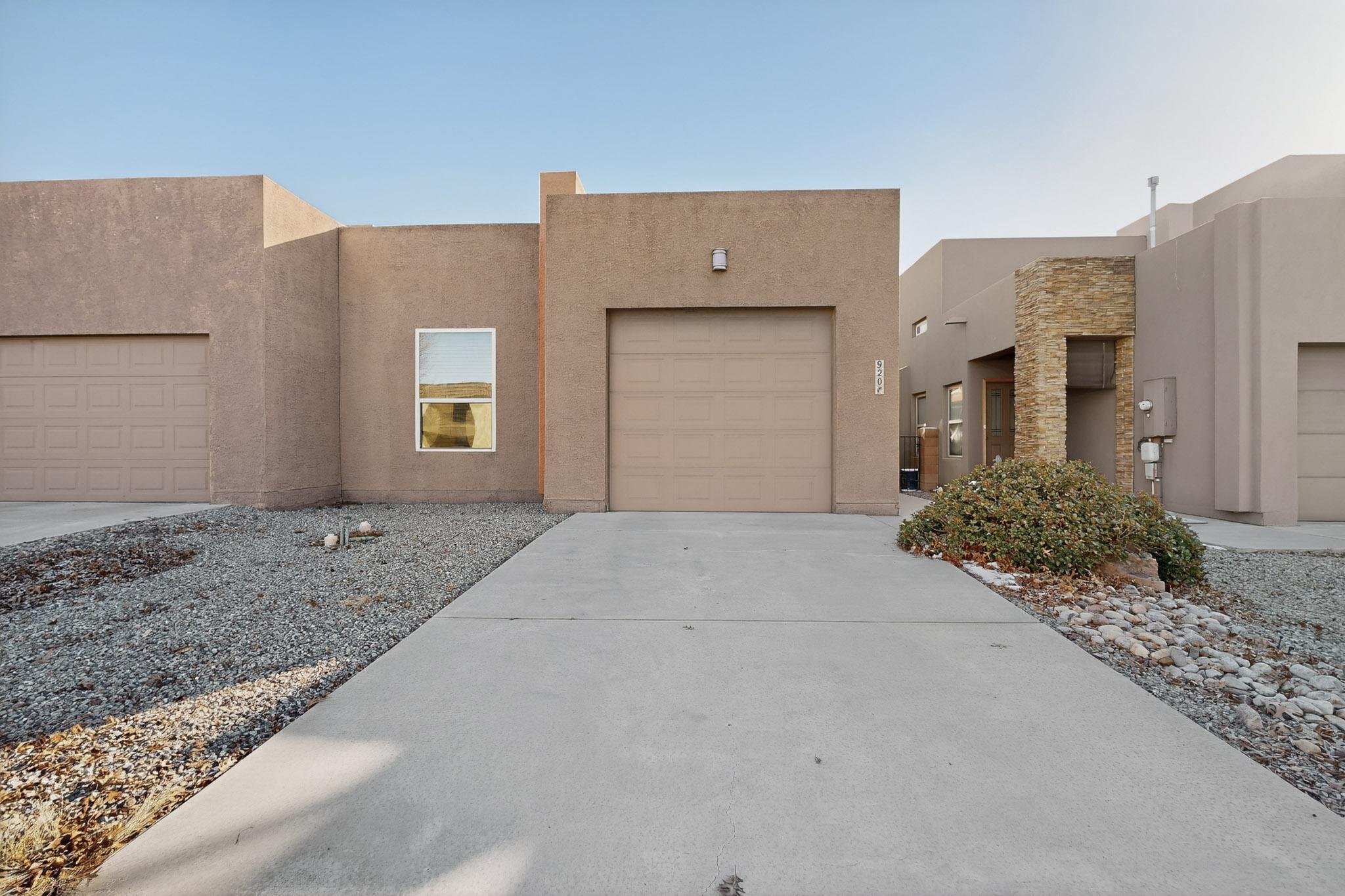 Charming 2-bedroom townhouse in an excellent NE location with no HOA! Light and bright floorplan featuring a welcoming living area that leads into the beautiful kitchen with granite countertops, pantry, and breakfast nook/dining area. Spacious bedrooms with walk-in closets. Large one-car garage provides ample storage space. Low-maintenance yard makes this home easy to care for. Conveniently located just minutes from I-40, shopping, dining, and entertainment.