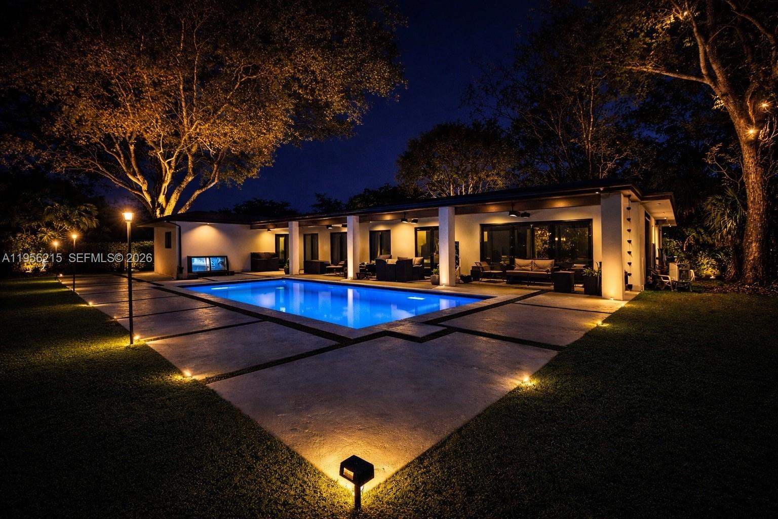 Fully renovated 4BR 3BA pool home located in a quiet, serene neighborhood close to top rated schools. Features two living areas, formal dining room, and a 2 car garage. Modern kitchen with Bosch appliances, pot filler, custom sunken ceiling with ambient lighting, and designer under counter and island lighting. Modern bathrooms include three heated built in bidet toilets and LED back lit mirrors. 13 ft hurricane impact sliding door that fully opens in the family room, offering seamless indoor outdoor living with pool views. All new hurricane windows and doors. Interlock driveway, new stucco, front and back landscape lighting, new concrete patio, and Ring camera system.  Move in ready.