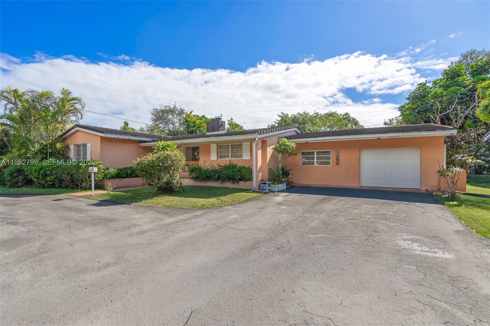 Welcome to 1230 Bird Road, a bright and inviting residence designed for effortless Miami living. This open concept home offers a seamless flow between the living, dining, and kitchen areas, highlighted by bamboo wood floors and an abundance of natural light, ideal for everyday living and entertaining. Oversized lot with pool complete with spa and garden area great for entertaining. The modern kitchen features wood shaker cabinetry and stainless steel appliances, creating a clean and functional space that connects beautifully to the main living areas. The home offers three large bedrooms plus a versatile den, complemented by beautifully remodeled bathrooms. Step outside to your private backyard retreat with a pool, ideal for relaxing weekends and hosting friends year round. Thoughtfully laid out and easy to live in, this home blends comfort, functionality, and indoor outdoor living in a central Miami location.