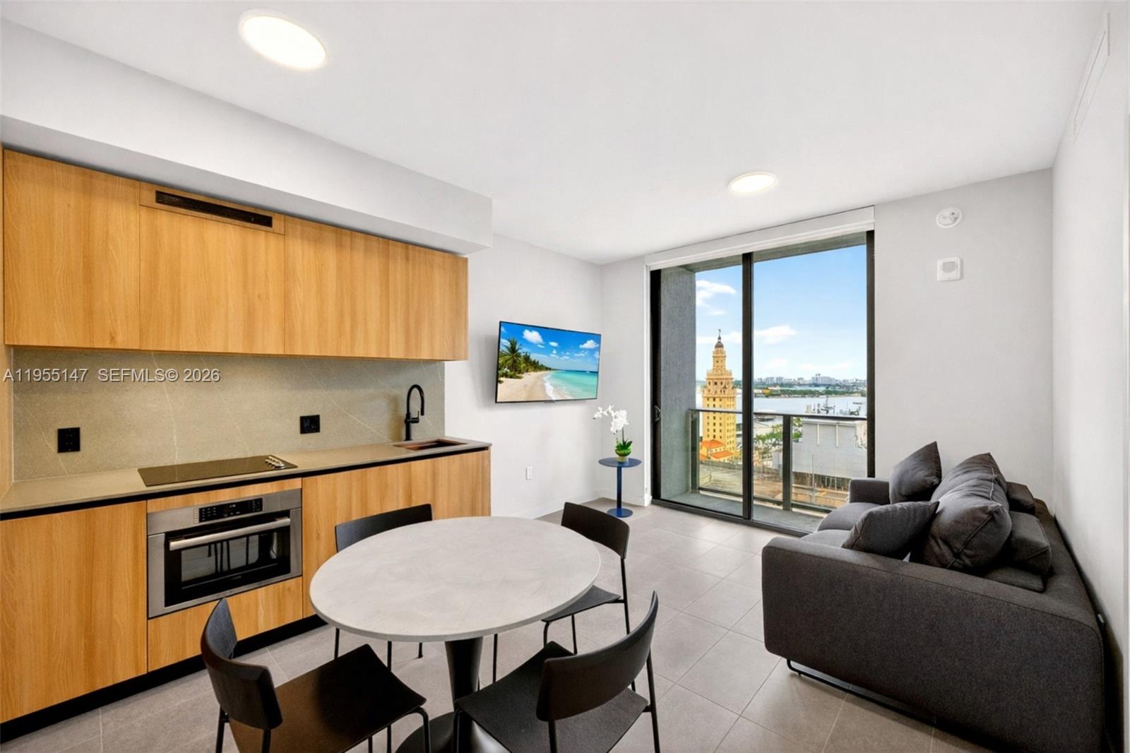 Experience luxury urban living at 501 First Residences, a brand-new 40-story condominium in Downtown Miami with no rental restrictions and exceptional income potential in the vibrant heart of Downtown Miami. This fully furnished 591 SqFt 1 Bed / 1 ½ Bath east-facing residence features expansive skyline and bay views, overlooking Downtown Miami landmarks including the Freedom Tower, PortMiami, and Biscayne Bay. Modern design, floor-to-ceiling windows, private balcony,custom Italian cabinetry and in-unit washer/dryer. Located just steps from Miami Worldcenter, dining, entertainment, transit, and cultural destinations, 501 Residences redefines downtown lifestyle with over 20,000 sq. ft. of  resort-style amenities including 24/7 valet, rooftop pool, fitness center, co-working spaces, pet lounge, private club suite, media room, and more. A turn-key opportunity in Miami’s most dynamic urban core. Ideal for full-time living or income-generating investment