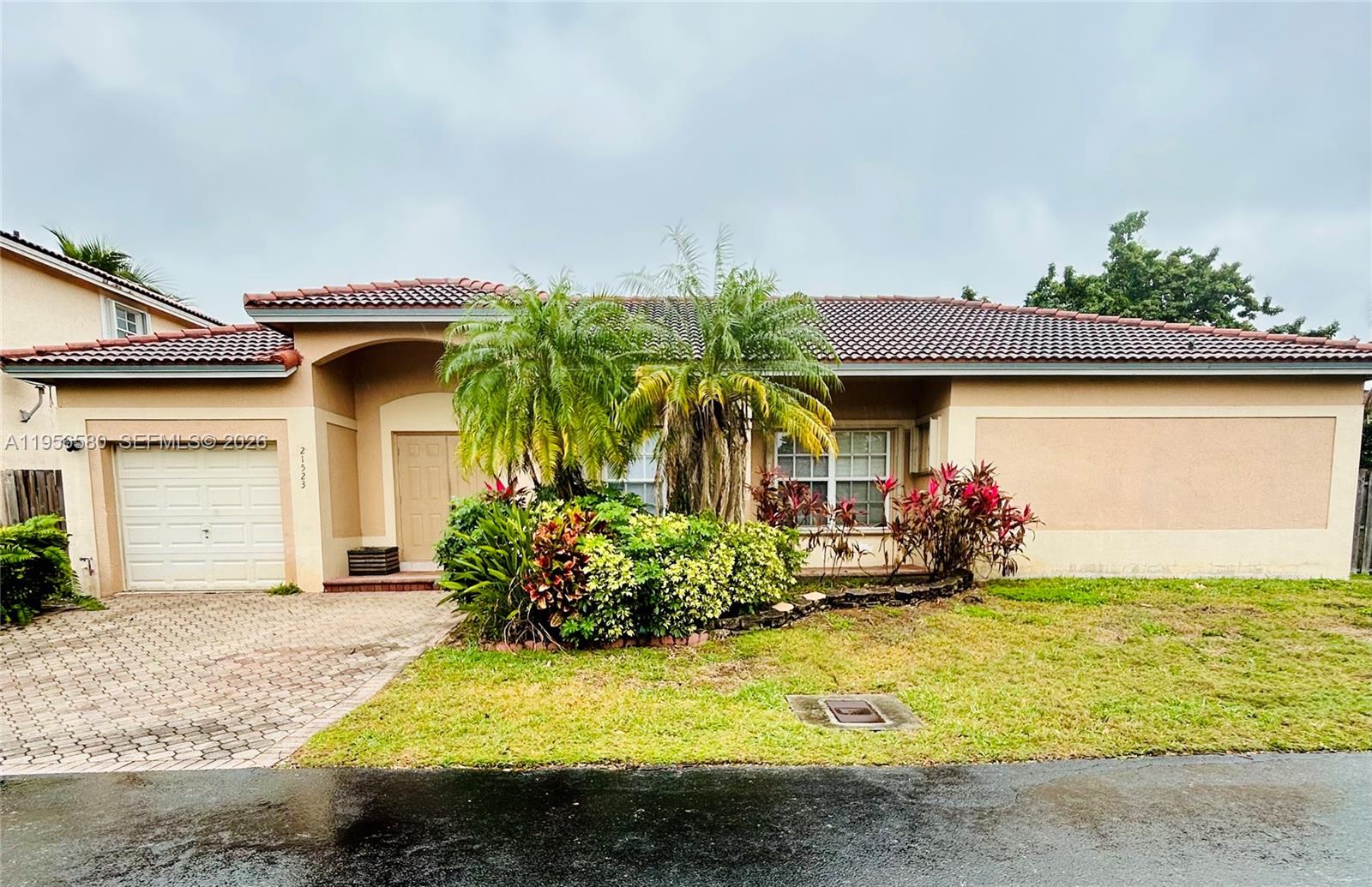 Welcome home to this spacious gem in the heart of Cutler Bay! Located in a quiet, family-friendly community, this beautifully maintained 3/ 2 residence offers the perfect blend of comfort and versatility.Step inside to an expansive living room designed for entertaining, complemented by a formal dining room and a cozy family room—plenty of space for gatherings, celebrations, or simply relaxing at home. The kitchen shines with sleek stainless steel appliances, making meal prep both stylish and functional. The generously sized primary suite is your private retreat, featuring an upgraded bathroom for a touch of modern luxury.An additional space possibly for a 4th bedroom—ideal for guests, a home office, or multigenerational living. A dedicated laundry room adds everyday convenience, while the fully fenced yard offers privacy, security, and room to enjoy the outdoors.