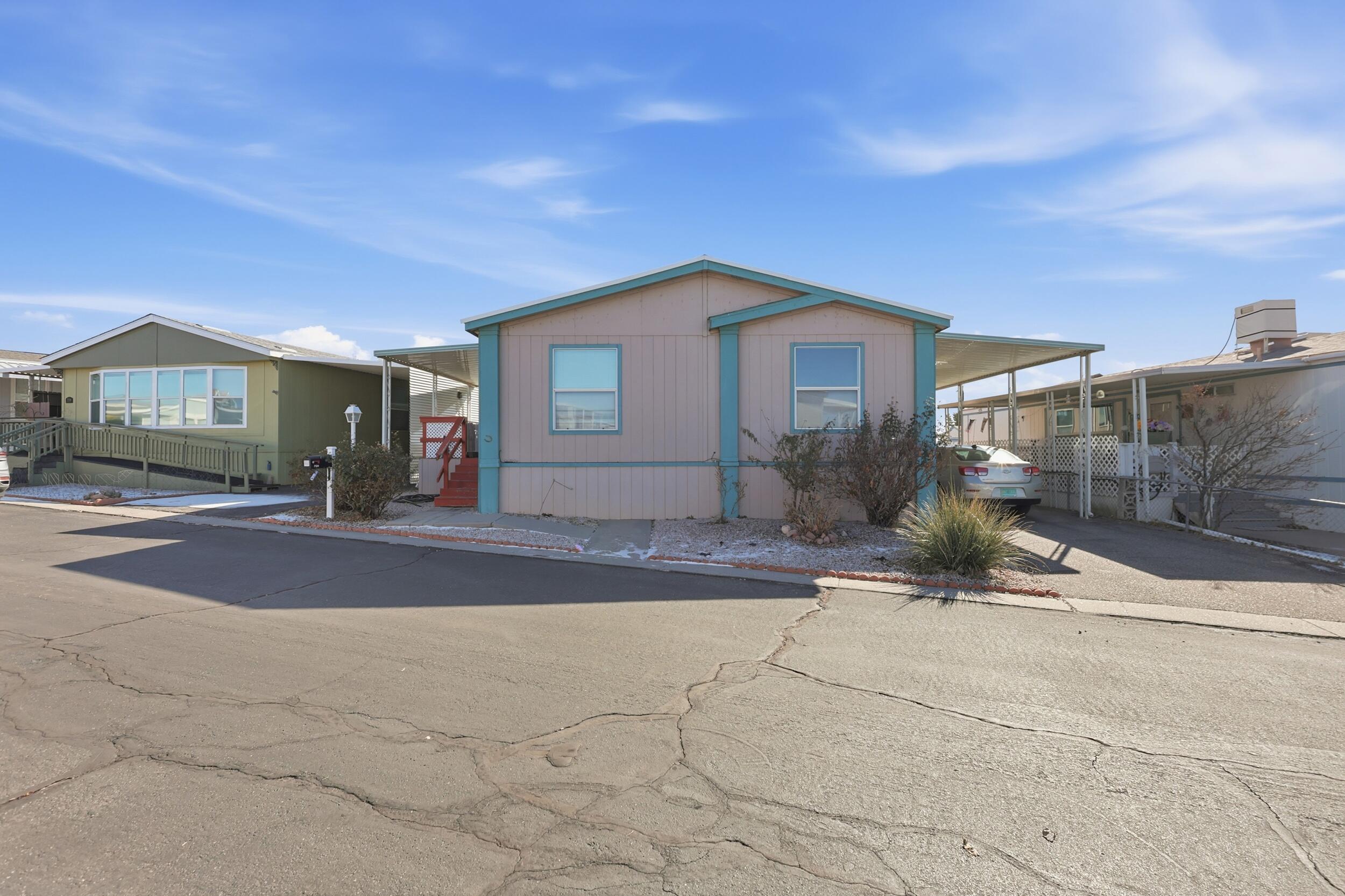 Welcome to your ideal low-maintenance retirement retreat in a desirable 55+ community! This spacious and impeccably maintained 3-bedroom, 2-bath manufactured home offers comfortable living with plenty of room to relax and entertain. The kitchen features a center island, ample cabinetry, stainless appliances and a breakfast nook, perfect for those morning coffees. North Hills MHP offers many amenities such as a pool, tennis courts, and a vibrant clubhouse for social gatherings, events, and hobbies. This prime location puts you just minutes from convenient shopping, diverse dining options, and easy access to I-25 for quick trips to nearby attractions or cities. Schedule your showing today!