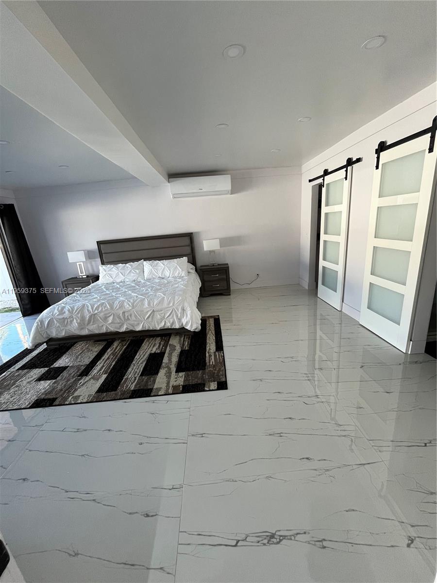 Elegant master bedroom retreat at 39 7th St - Home in Dania Beach