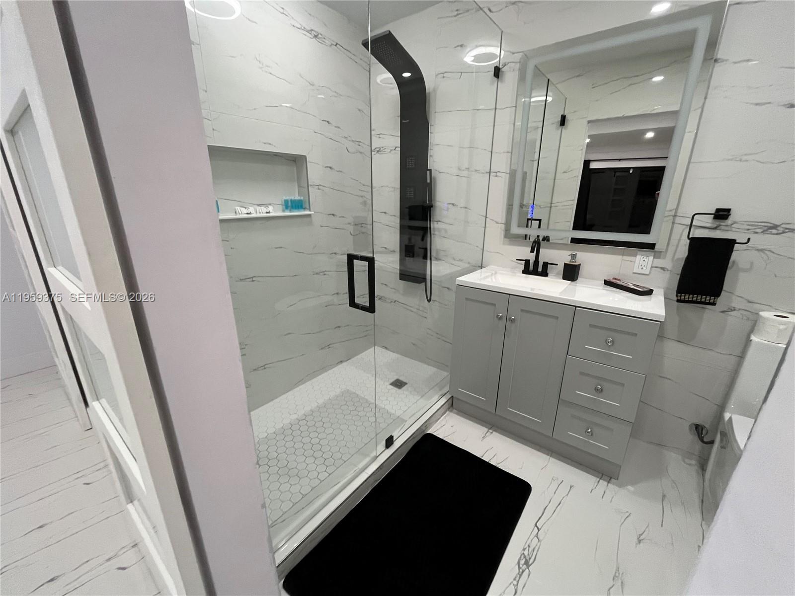 Well-appointed guest bedroom at 39 7th St - Home in Dania Beach