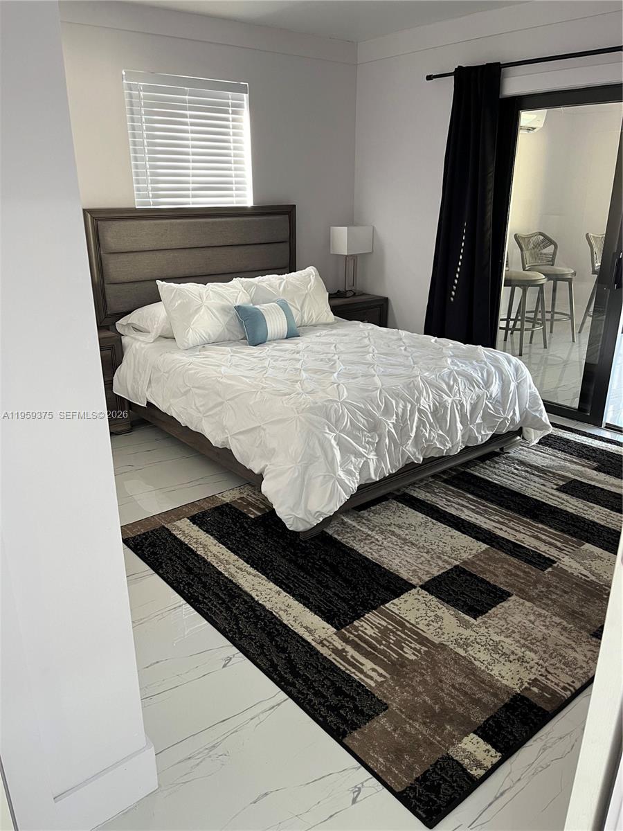 Elegant master bedroom retreat at 39 7th St - Home in Dania Beach