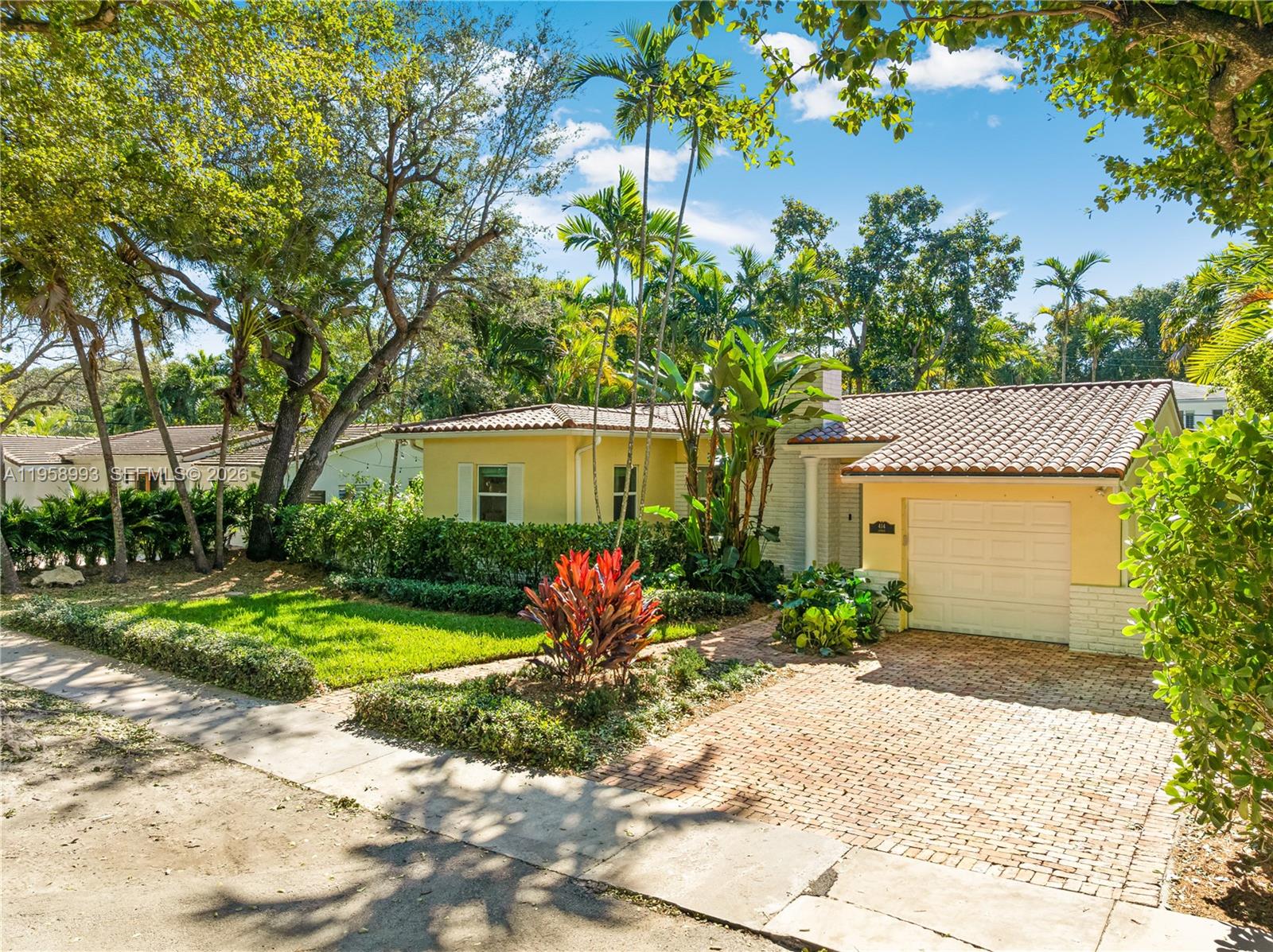 Charming home on 7500 sq. ft. lot in an exceptional Coral Gables location just minutes from the Youth Center, Coral Gables Library, downtown Coral Gables, and neighboring schools. This meticulously-maintained and move-in ready residence features an open, light-filled layout, fully renovated bathrooms and a modern primary suite with custom built-in cabinetry.  Upgrades include PVC piping installed for brand new septic system and updated bathrooms, 2018 roof, impact windows, EV charging station, expanded brick driveway for additional parking space, and an air-conditioned garage being used as a flex space.  Additional features include a flooring combination of hardwood and ceramic tiles, fireplace, alarm system, Eufy doorbell with camera, spacious backyard offering low-maintenance turf, two patio areas ideal for entertaining, and ample room for future expansion or a pool. An exceptional opportunity in one of the Gables’ most desirable neighborhoods.  PLEASE CALL INES MARTA FOR SHOWINGS OR INFO 786-452-4910.