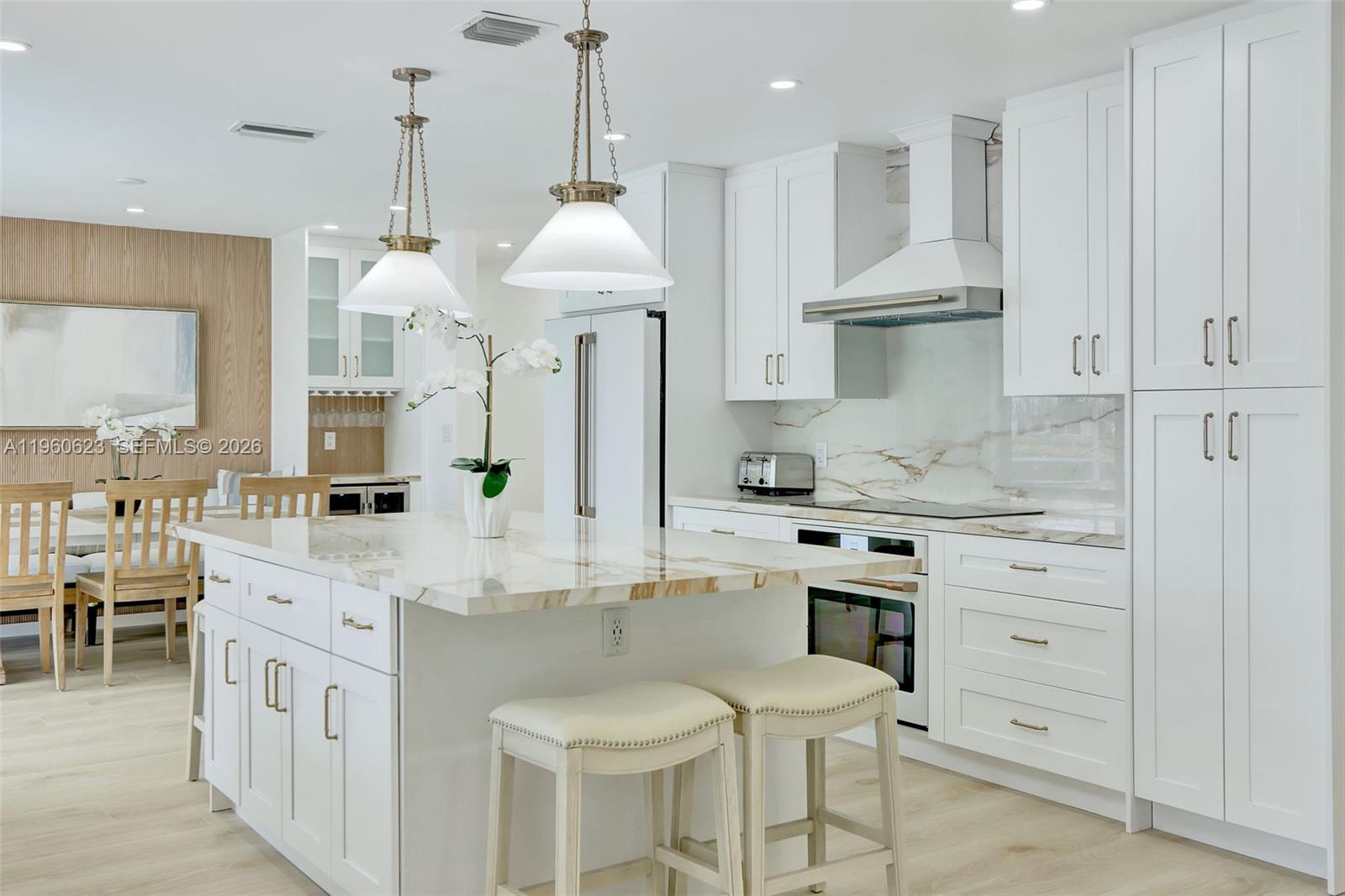 Fully renovated and permitted 4-bedroom, 3-bath single-family home located in Cypress Isles Estates on ocean-access water. Property features all-new electrical, sewer line upgraded to PVC (no cast iron), and impact windows and doors throughout. Screen-enclosed pool with ample outdoor entertaining space and dockage for a boat. Two-car garage with additional driveway parking. Offered furnished with professionally selected furnishings. Property has been successfully operated as a short-term rental; short-term rentals allowed per current zoning and local regulations. Conveniently located minutes from the beach, schools, restaurants, shopping, and the Pompano Pier.